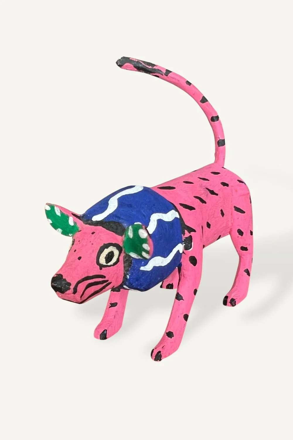 Santiago family pink lion Oaxaca wood carving
