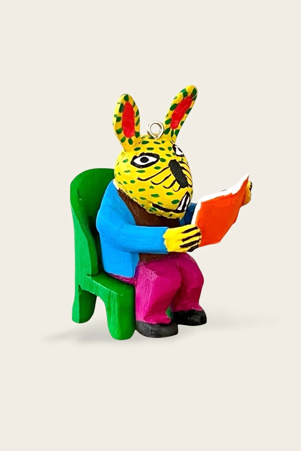 Carved in Oaxaca wooden reading rabbit ornament