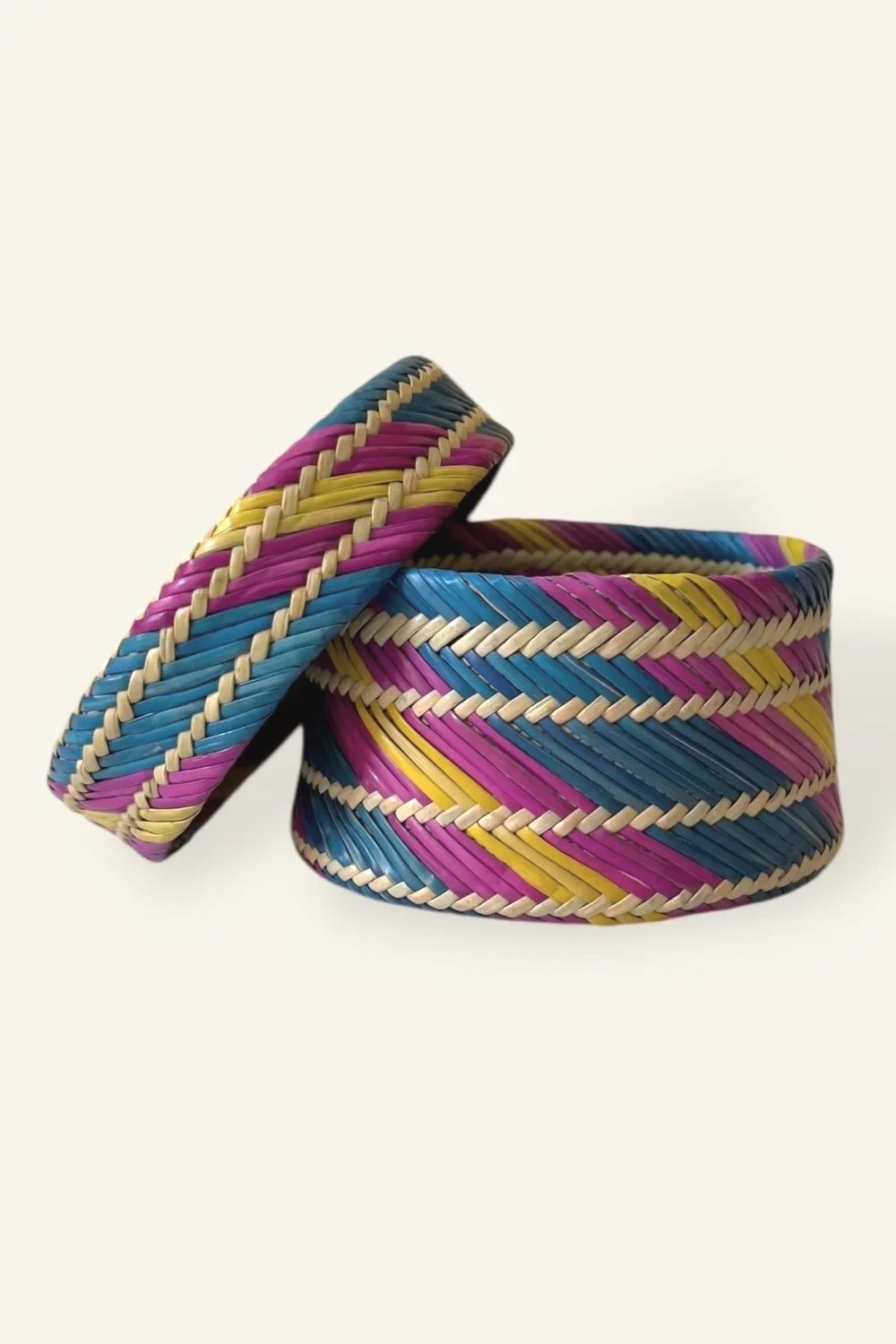 Rarámuri woven pine needle basket in blue and magenta