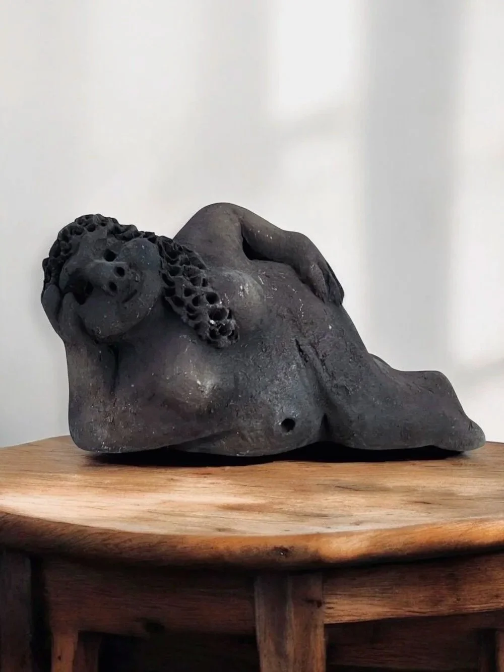 Reclining female clay sculpture made in Oaxaca