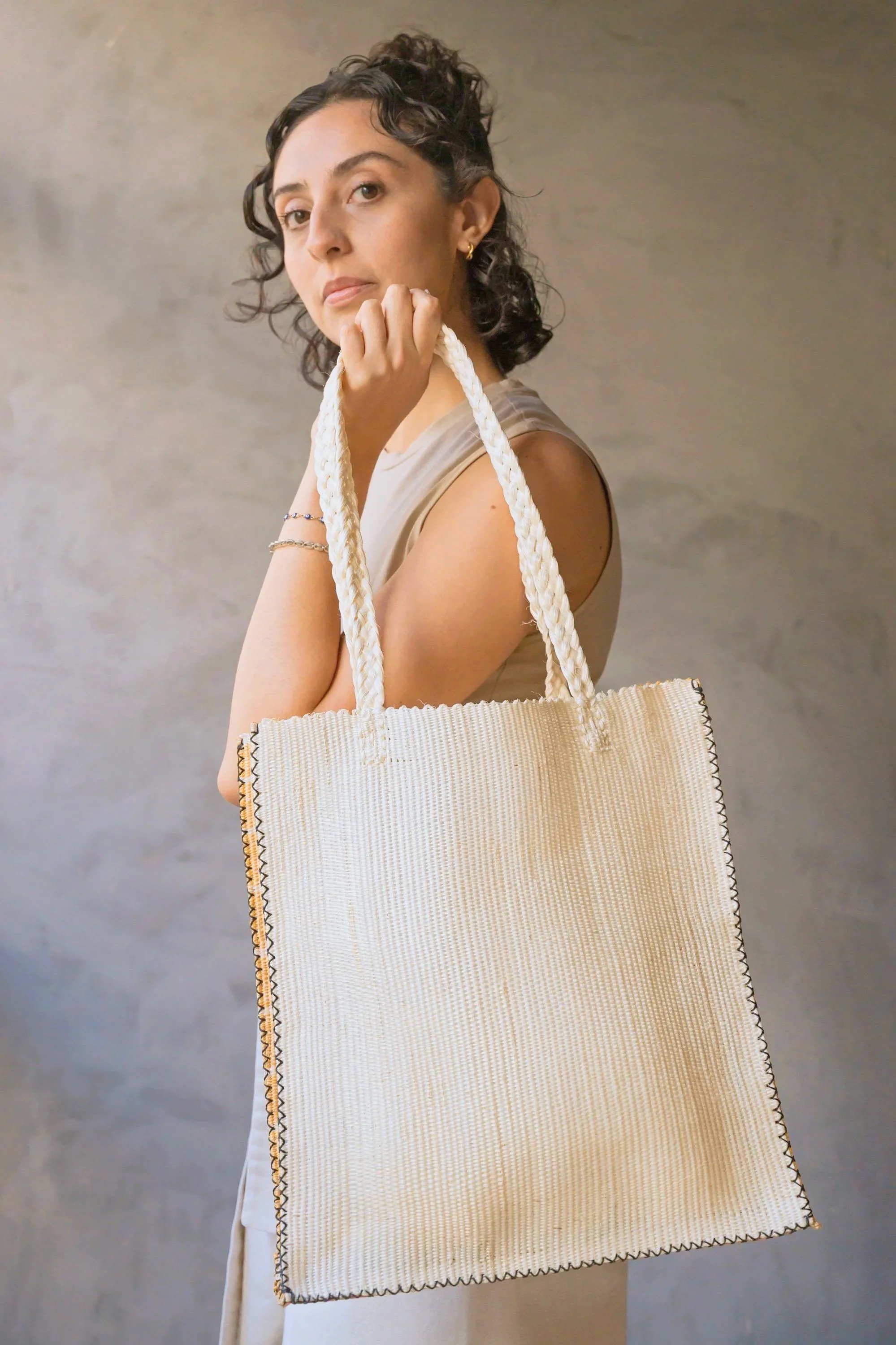 Straw tote of woven sisal in cream