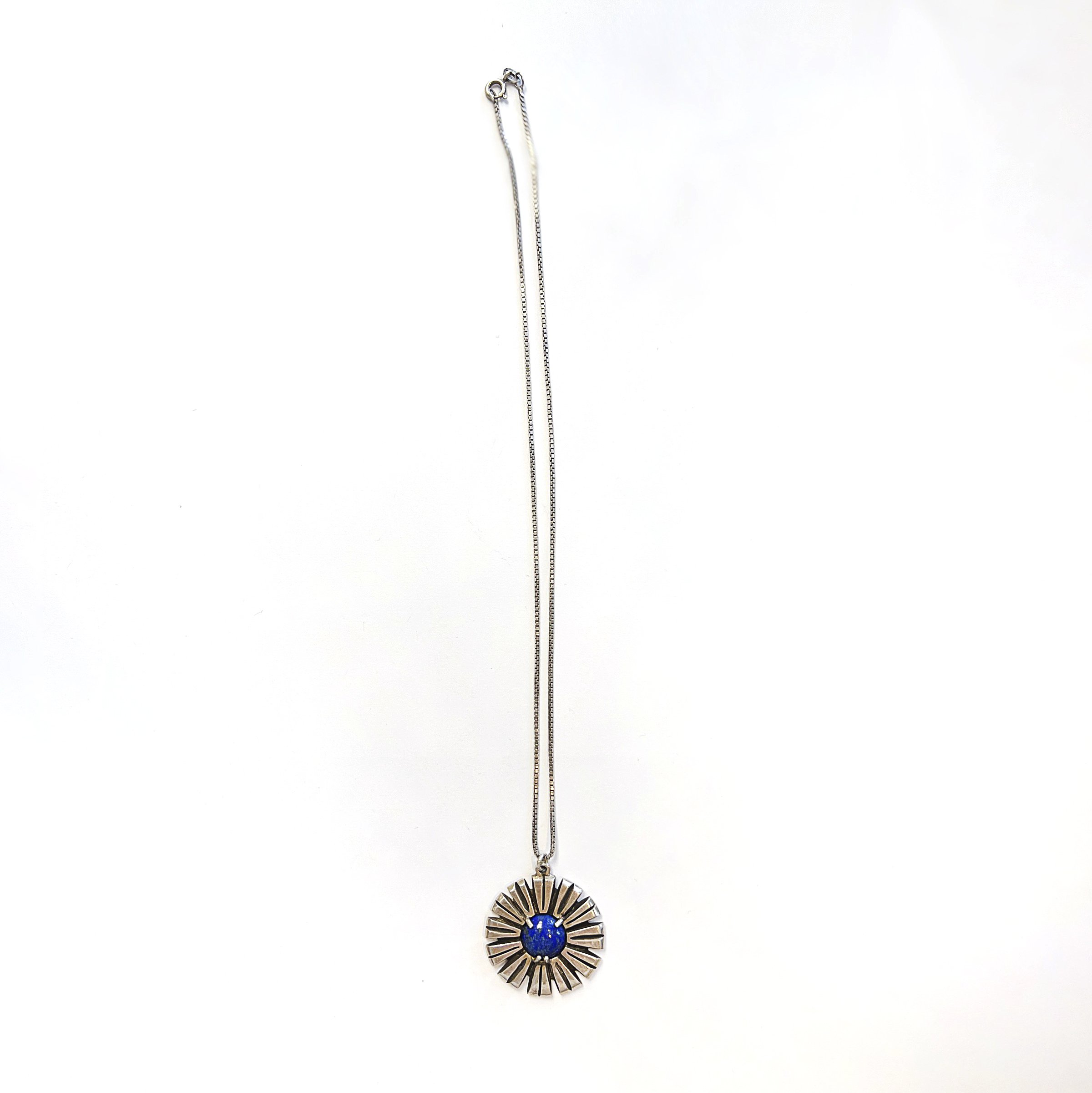 lapis silver sunburst necklace 1.jpeg