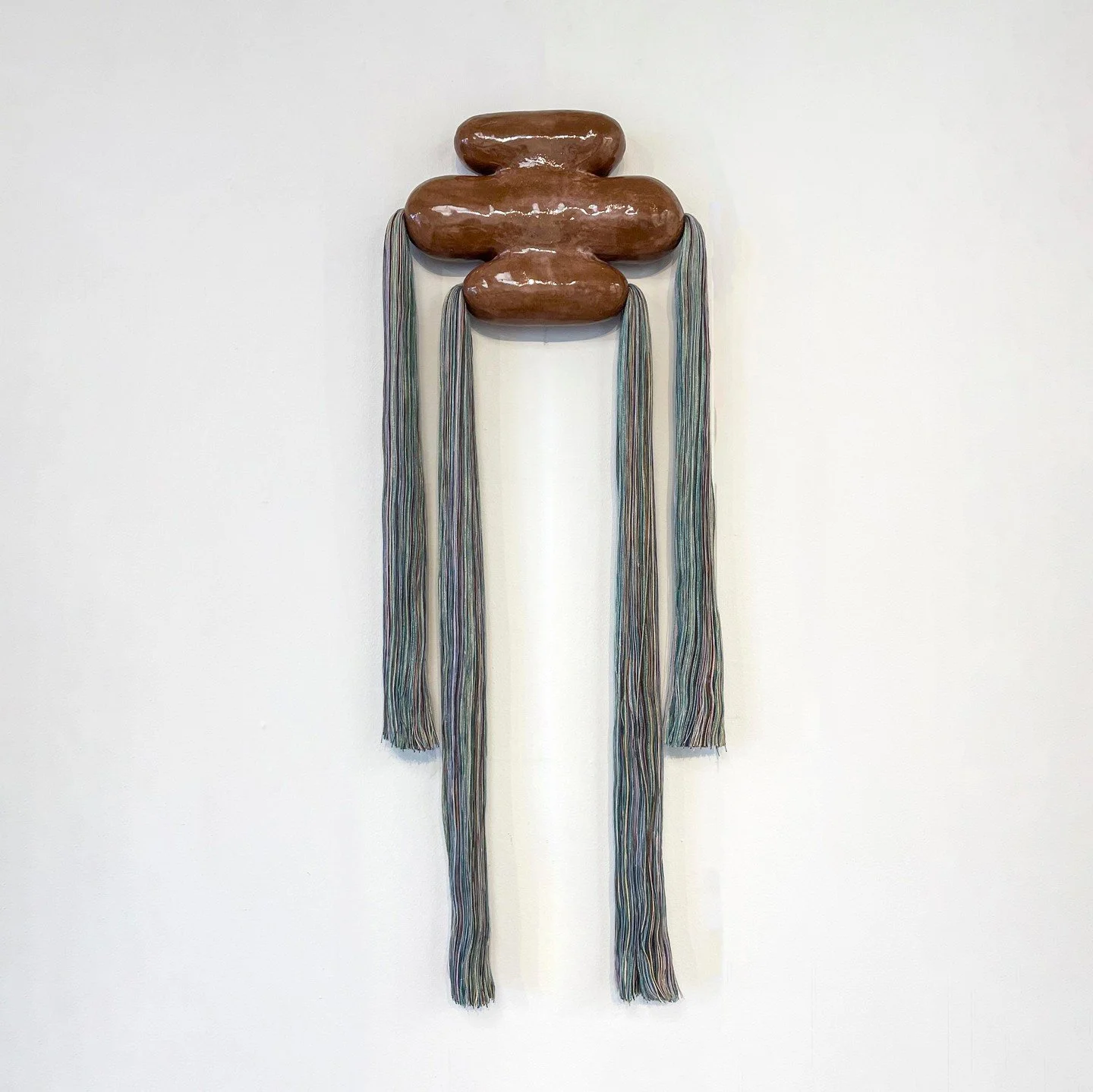 Eliza Bentz, &ldquo;Untitled.&rdquo; Hand built ceramic, cotton, and bamboo, 26 x 15 x 2.5 inches. ⁠
⁠
@eliza.bentz⁠
⁠
On Display in &ldquo;Speculative Structures,&rdquo; A Group Exhibition featuring Eliza Bentz, Maggie Evans, Jennifer Moss, Sharon N