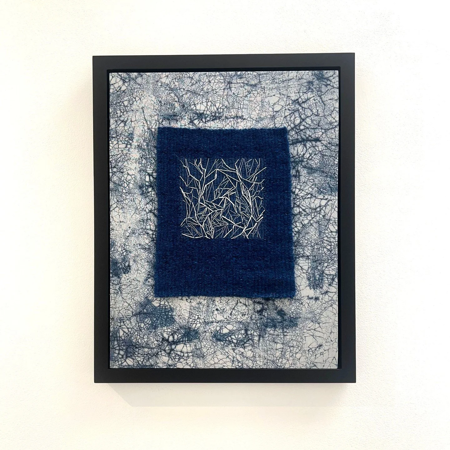 Treesa Germany, "Indigo Space #2"⁠. Indigo dyed cotton, wool, embroidery thread, 12 &times; 16 inches.⁠
⁠
@graymoonfibers⁠
⁠
On Display in &ldquo;Off the Wall,&rdquo; A Group Exhibition of small works featuring 30 supporters of Arts Southea