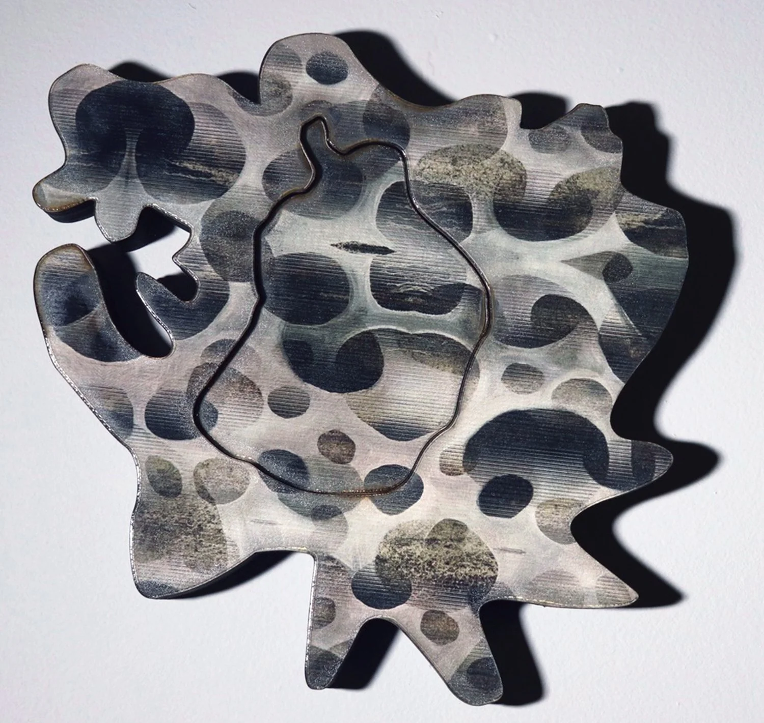  Hannah Keats, “Mesh,” 2025. Laser cut lenticular print on wood panel, 9.5 × 9.5 × 3 inches.  