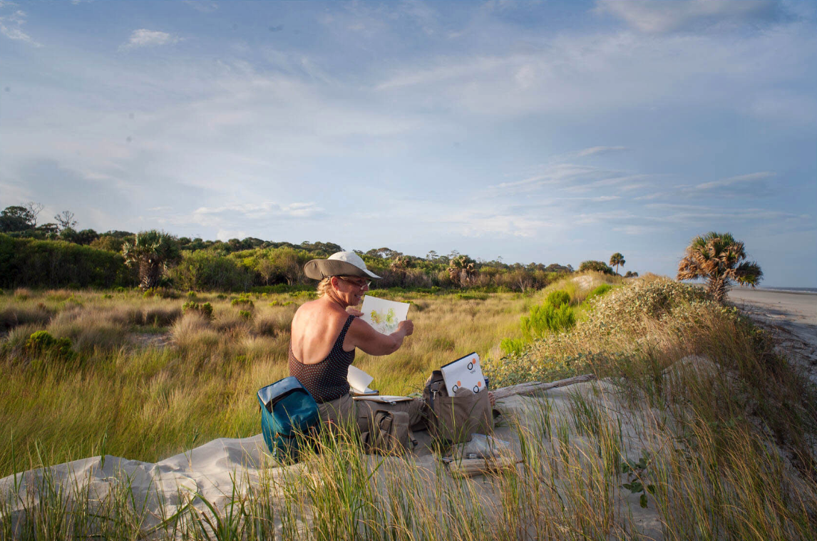 Betsy Cain drawing on the island, Photo by Imke Lass