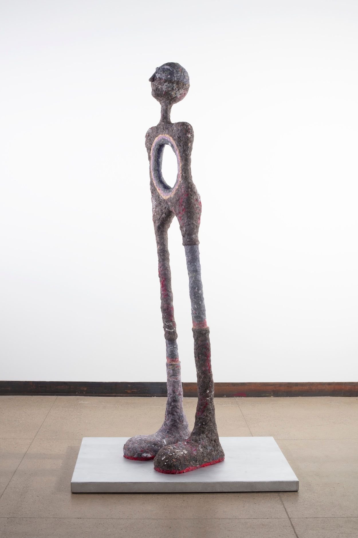  Cheryl Capezzuti,  Bipedal, Heroic XIV (Brothers),  2024 .  70 x 22 x 22 inches, Residential dryer lint collected from sisters who lost their brothers.  