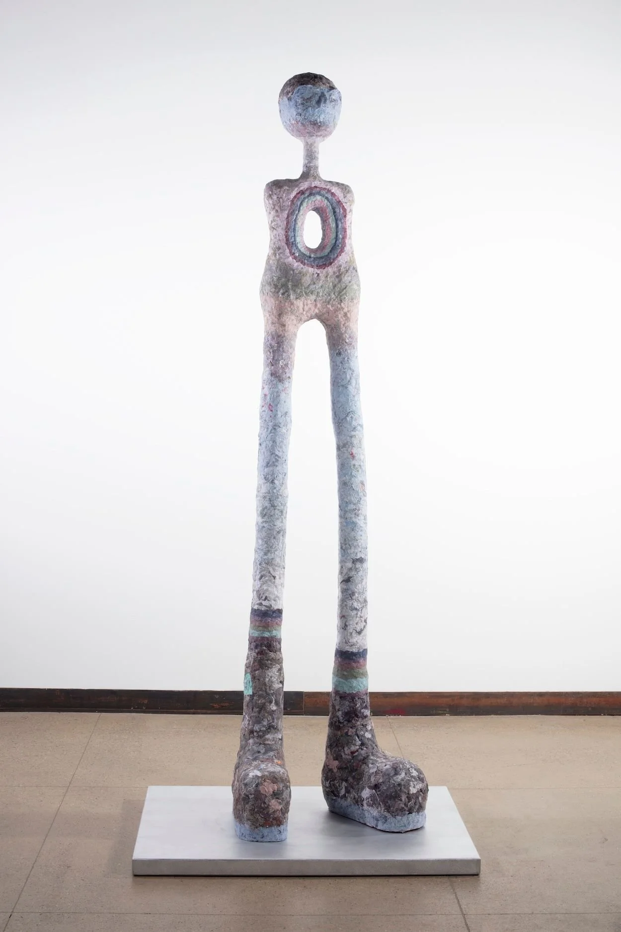 Cheryl Capezzuti,  Bipedal, Heroic XII (Octogenarians),  2024. 93 x 22 x 17 inches, Residential lint collected from three sisters and their friends.  