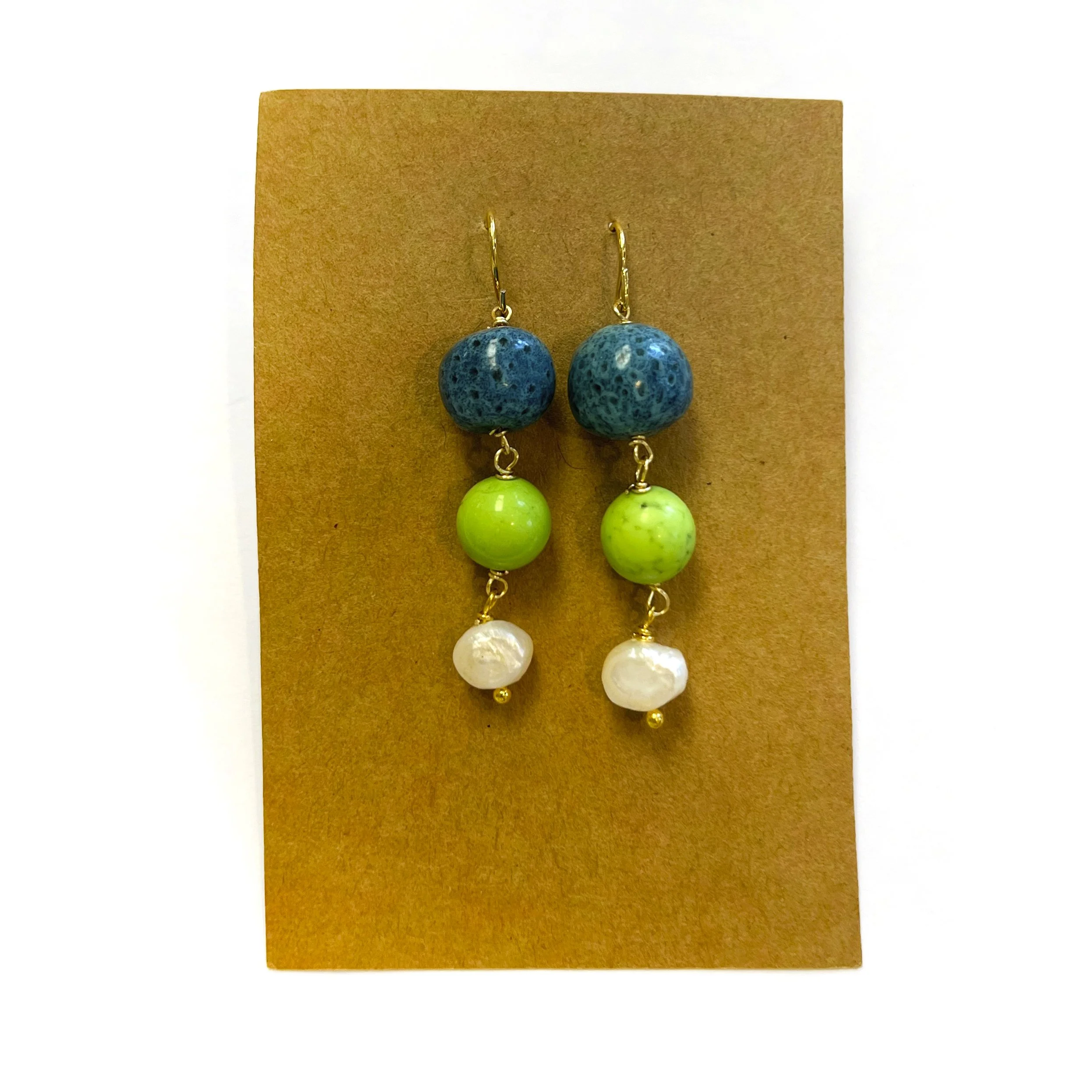 coral howl pearl ear 1.jpeg