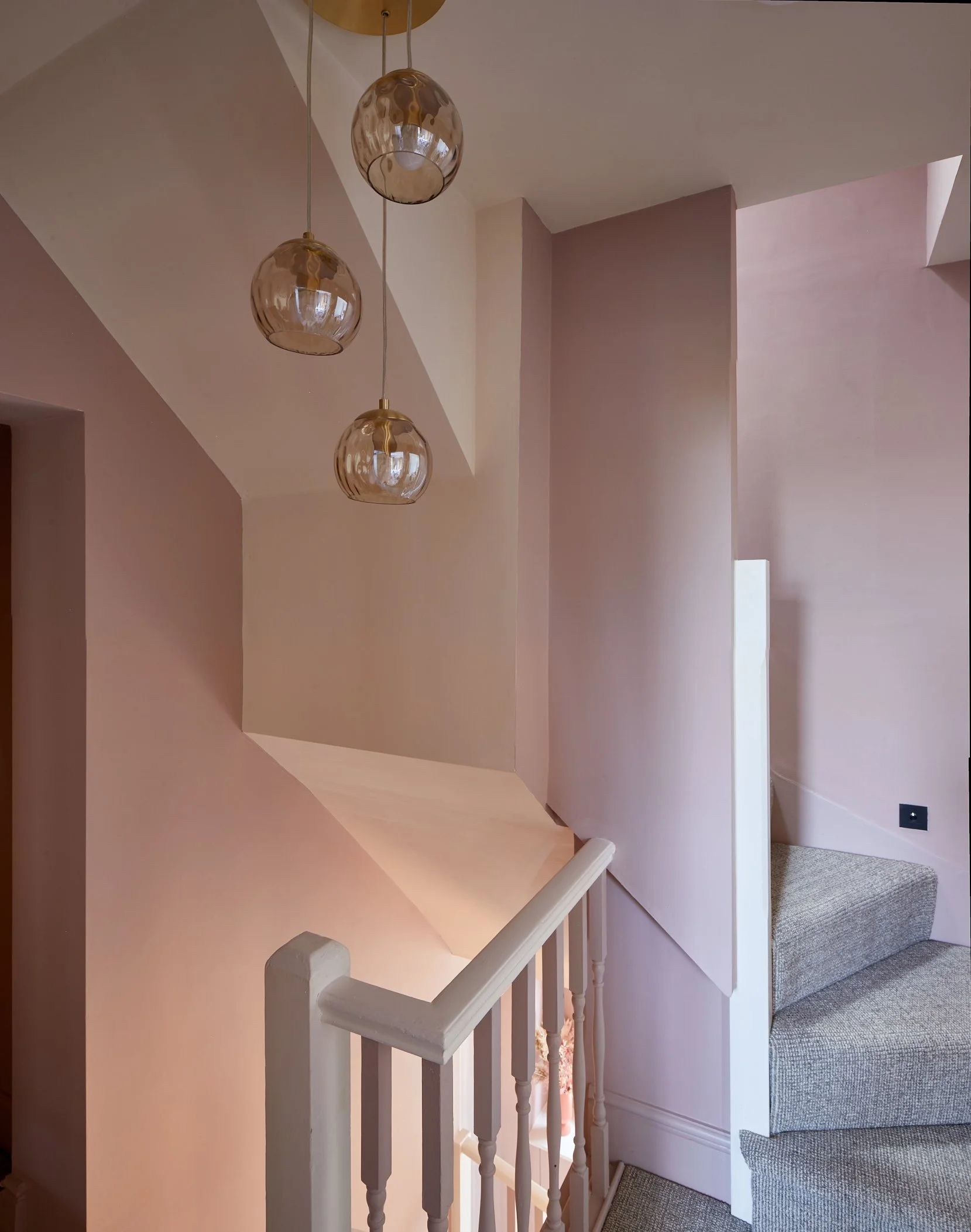 Statement lighting on first floor landing