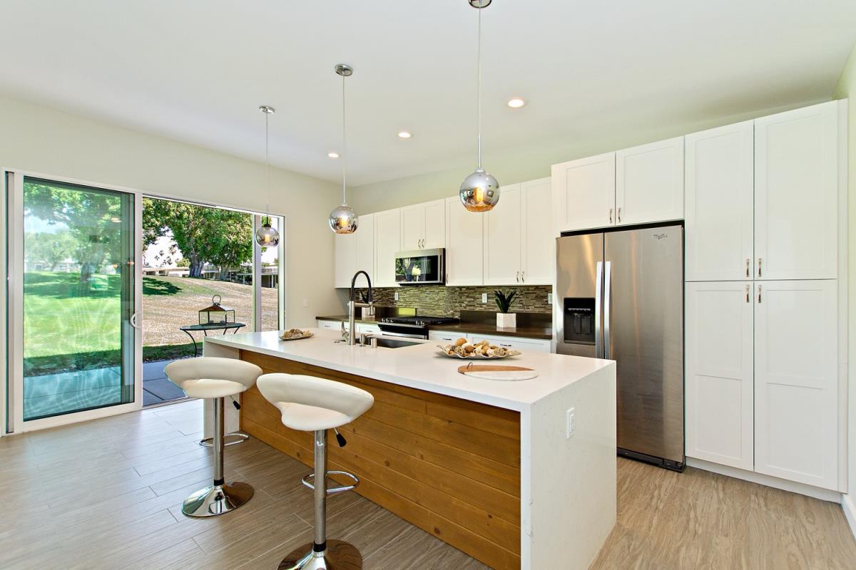 Miles kitchen pro shot for MLS looking out slider.jpeg