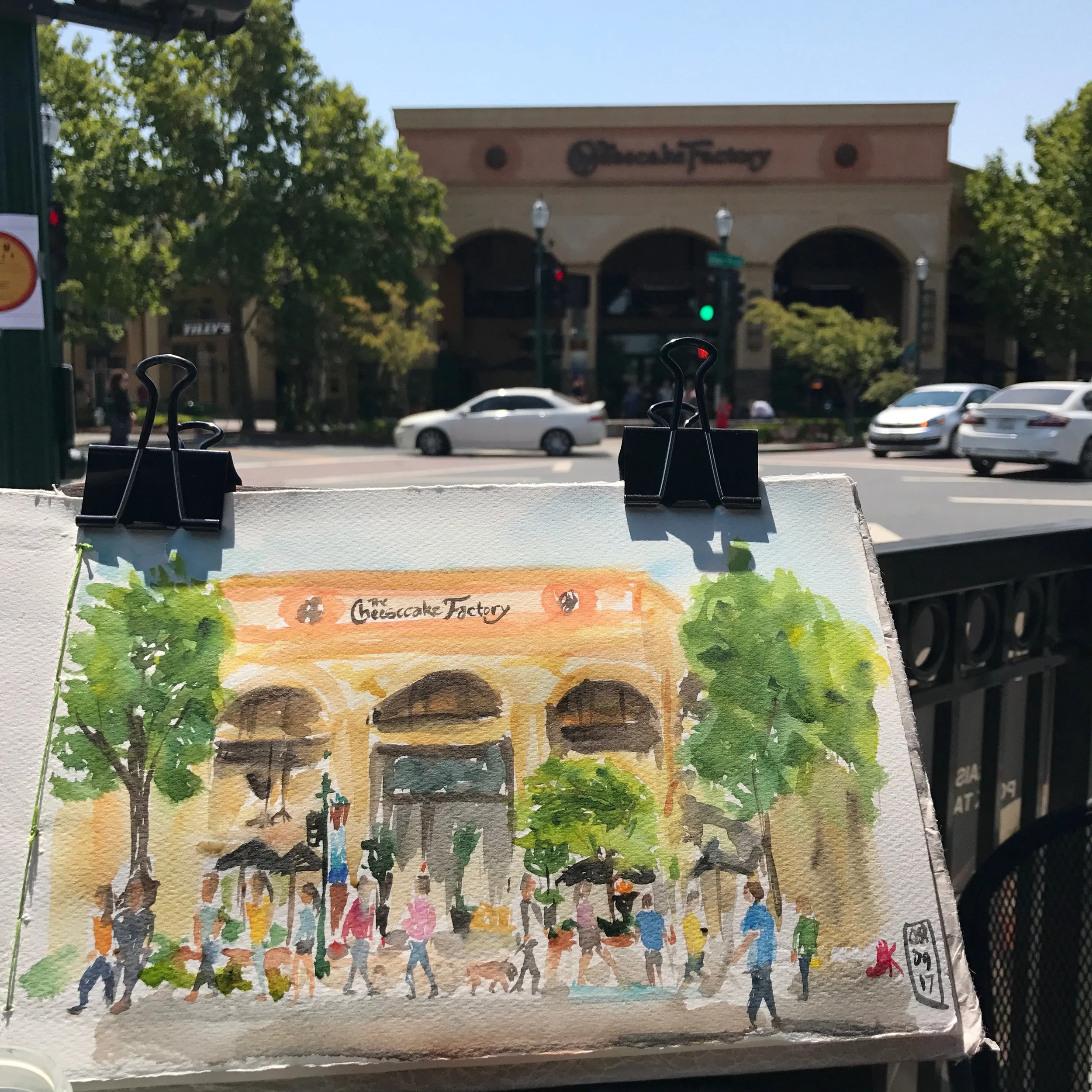 Here, I started with the people and then added the background building