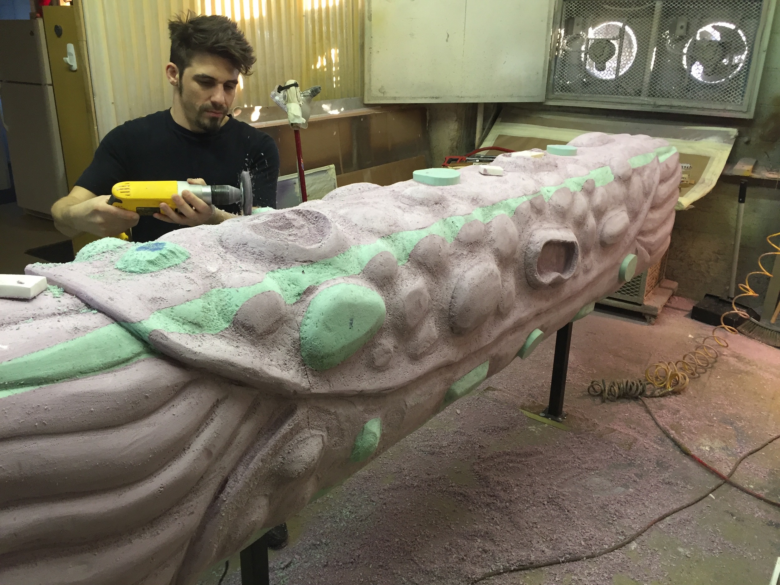 The team sculpts the giant cannoli from EPS foam