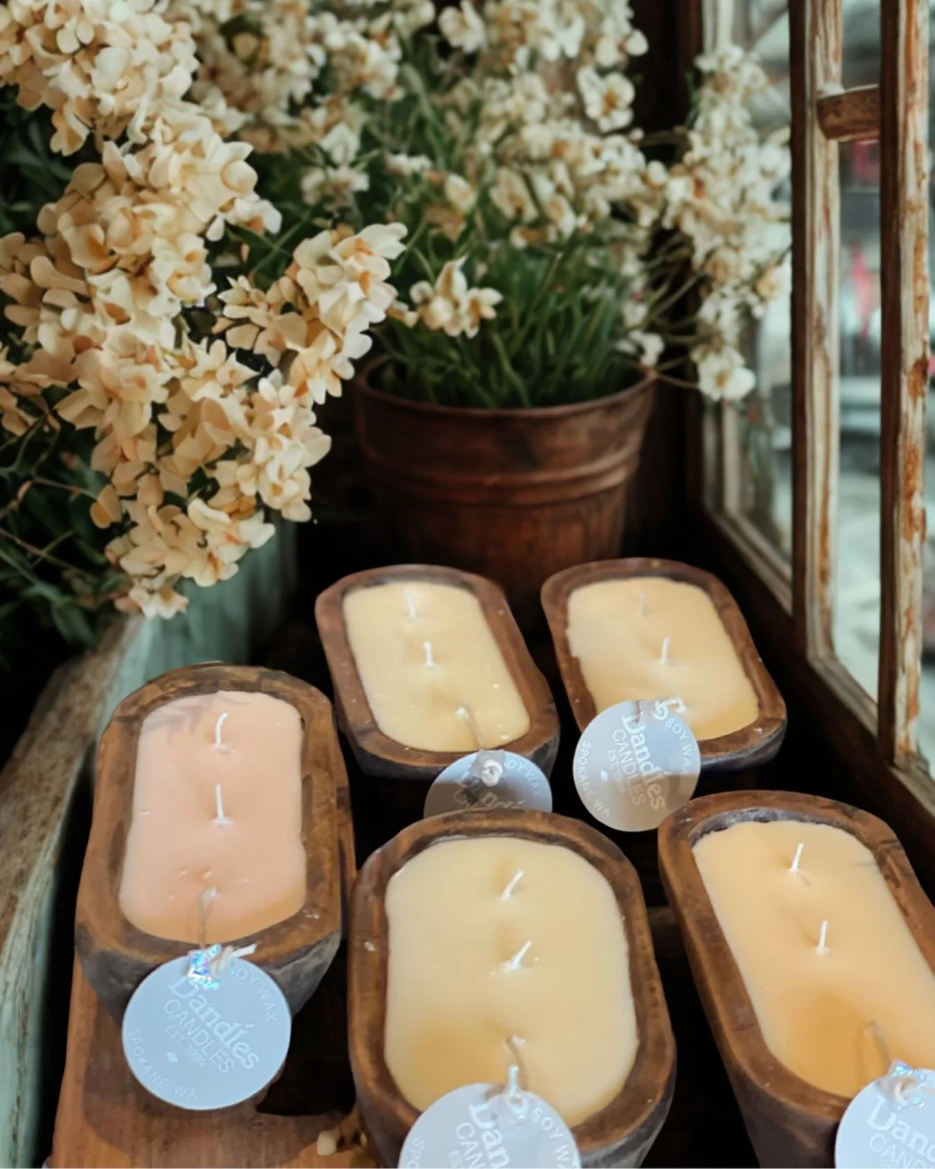 Blink and you&rsquo;ll miss these beauties. The wood bowl candles are nearly sold outline and not available in stores. Choose between these spring candle scents:
&bull; Country Porch Swing
&bull; Lilac City
&bull; Magnolia Garden
&bull; Orange Chiffo
