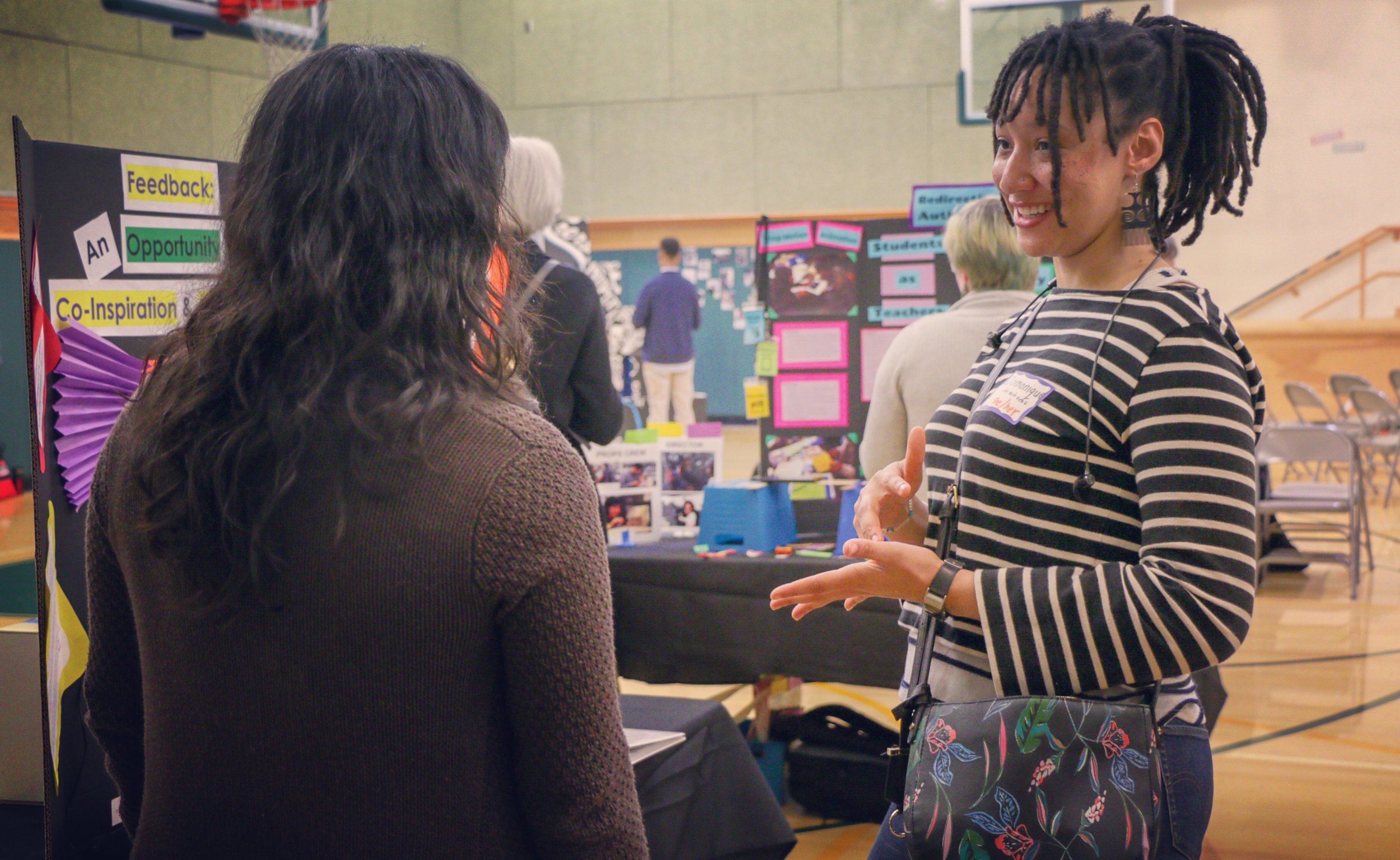 Agency by Design Oakland Fellow Veronica Haro shares her documentation board entitled “Feedback: An Opportunity for Co-Critique and Co-Inspiration” with participant Domonique Jimerson.