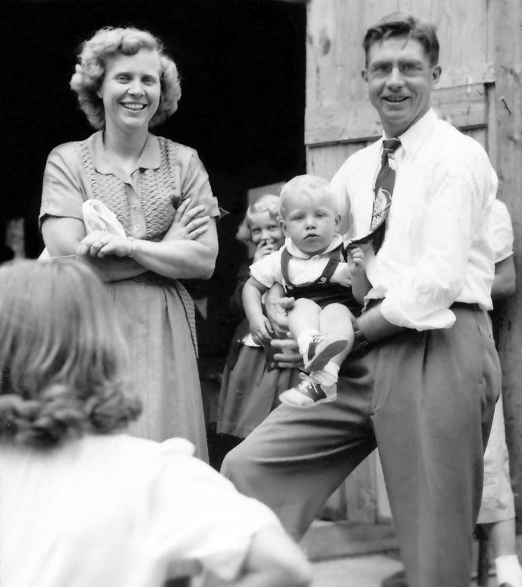 Ilene and Ernie Rockstad holding their second child of three and future president of Faith and Life Ministries Steve Rockstad.