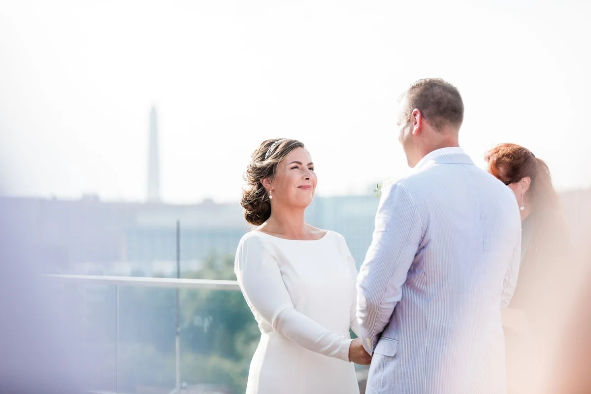 Intimate rooftop wedding ceremony in Washington DC by Apt. B Photography