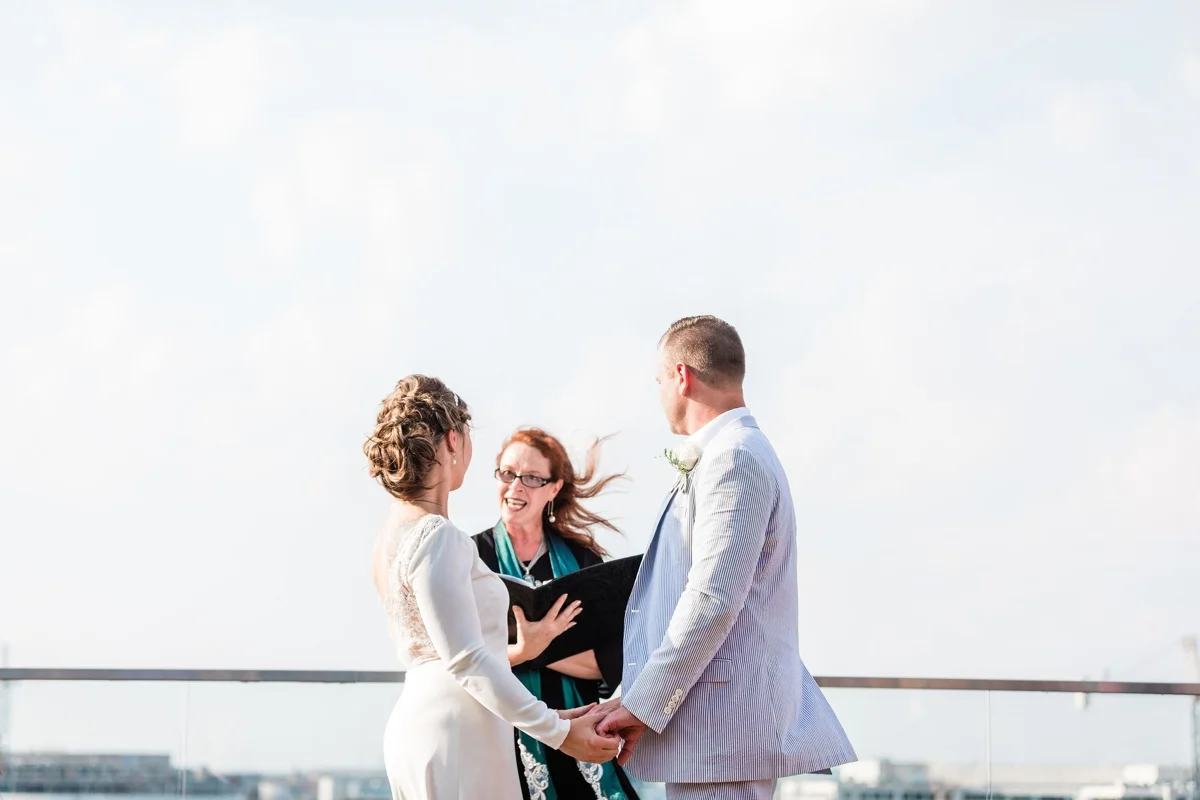Intimate rooftop wedding ceremony in Washington DC by Apt. B Photography