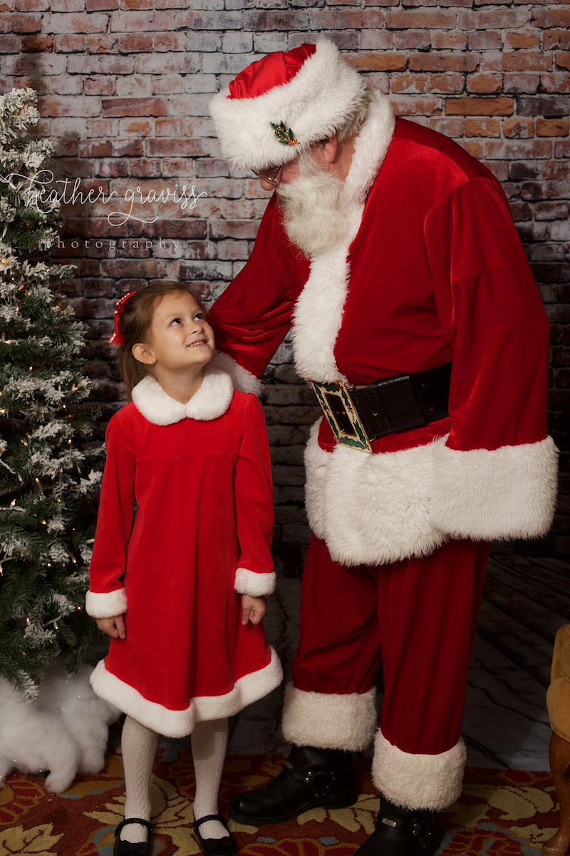 little-girl-looking-at-santa.jpg