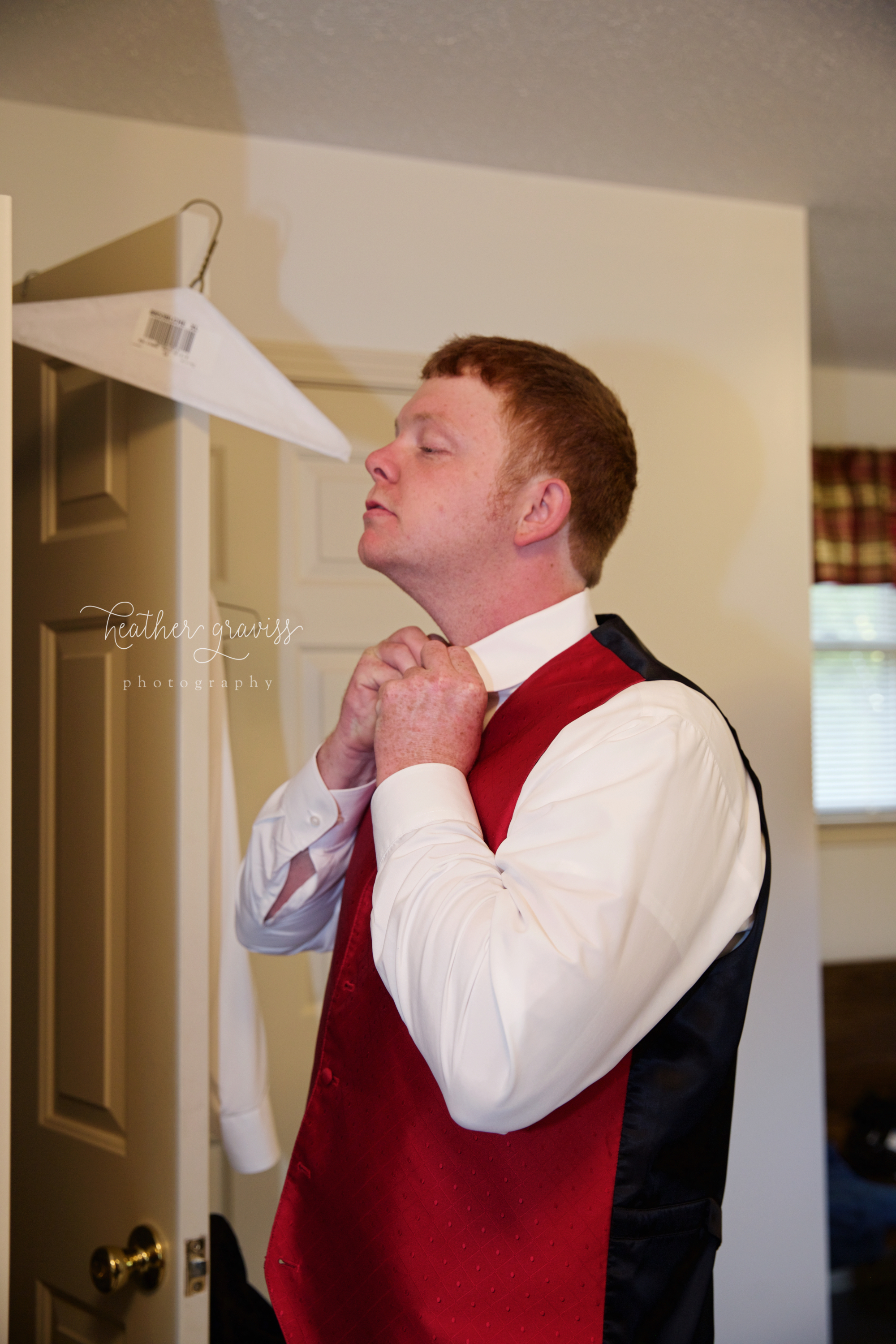 11 groom-straightening-tie.jpg