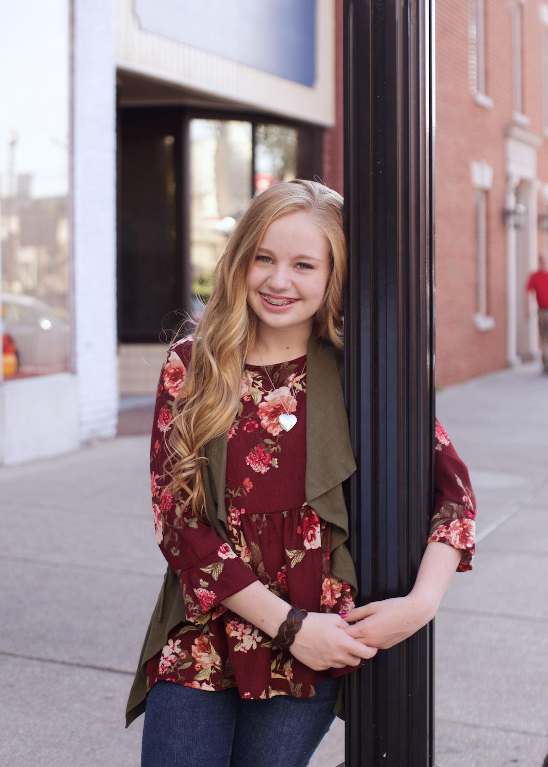 teen-girl-leaning-on-lightpost.jpg