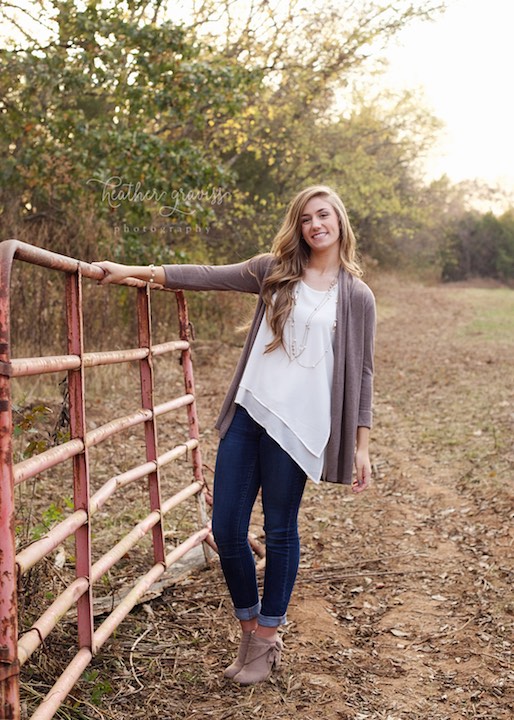 girl-on-farm-fence.jpg