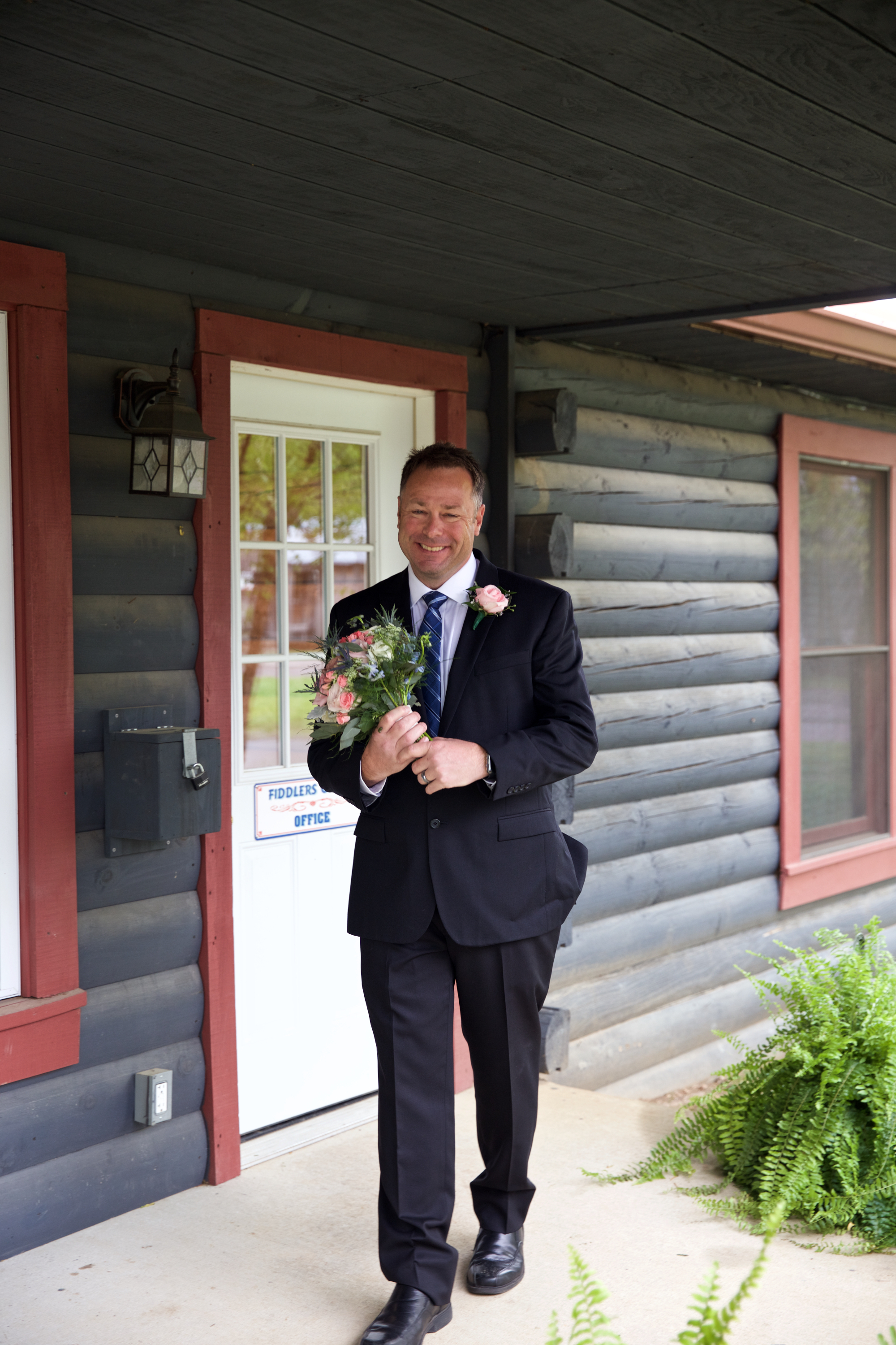 22father-with-bouquet.jpg