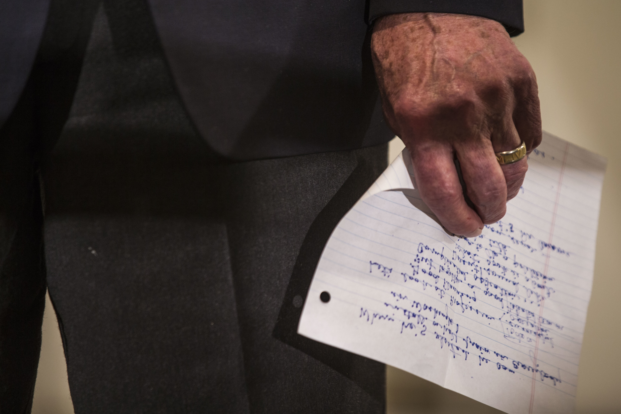 Senator Chuck Grassley (R-IA) holds his speech draft in his hand as he opens for Ben Carson in Iowa City