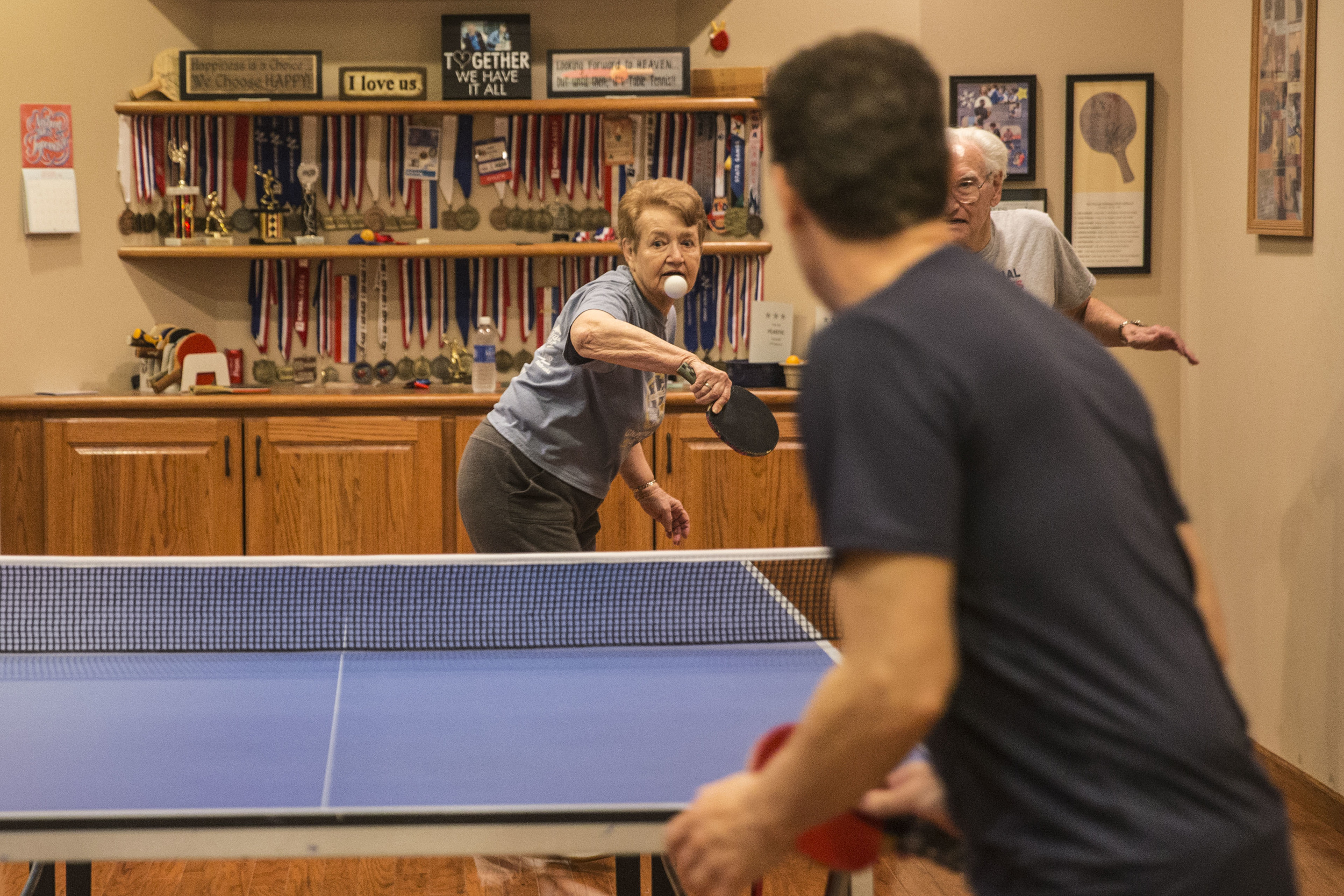 Jared & Leia play table tennis at their house's basement