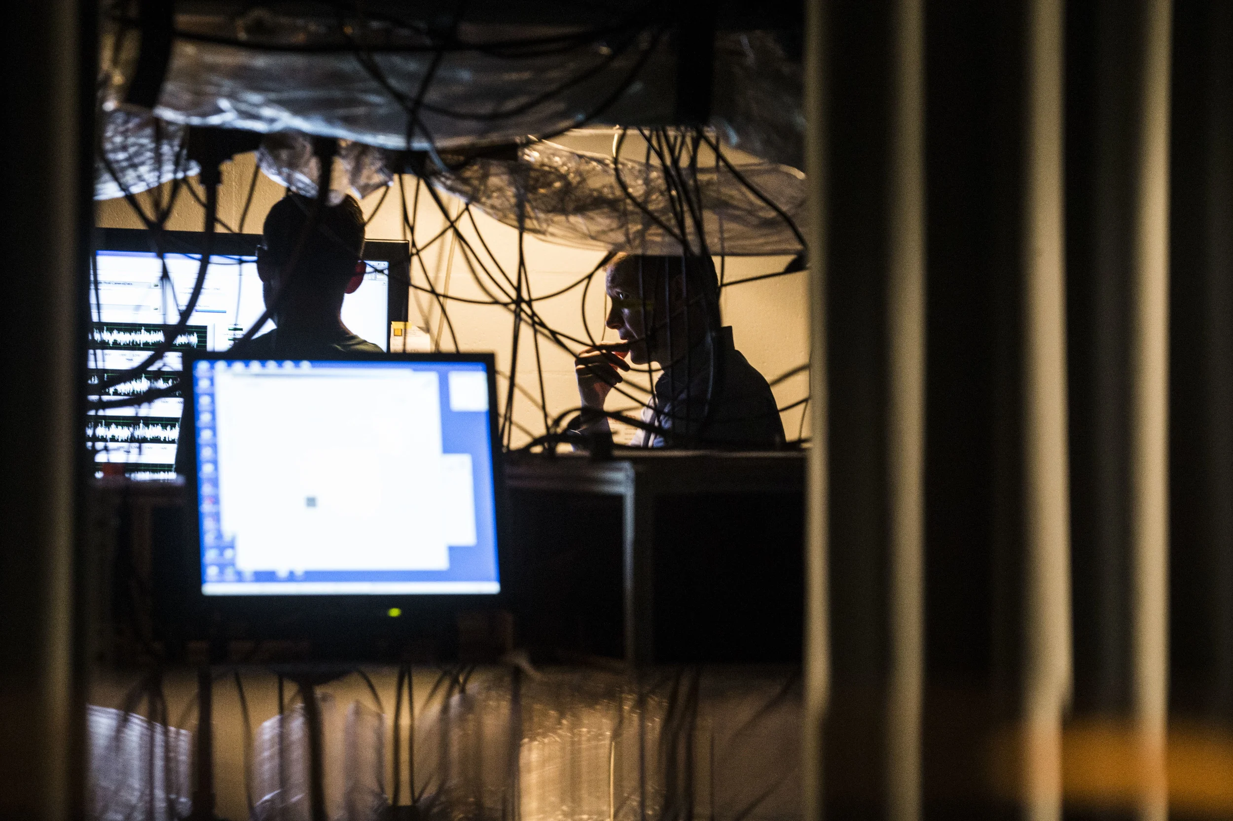 University of Iowa professor Christopher Cheatum is seen during an experiment at his laboratory