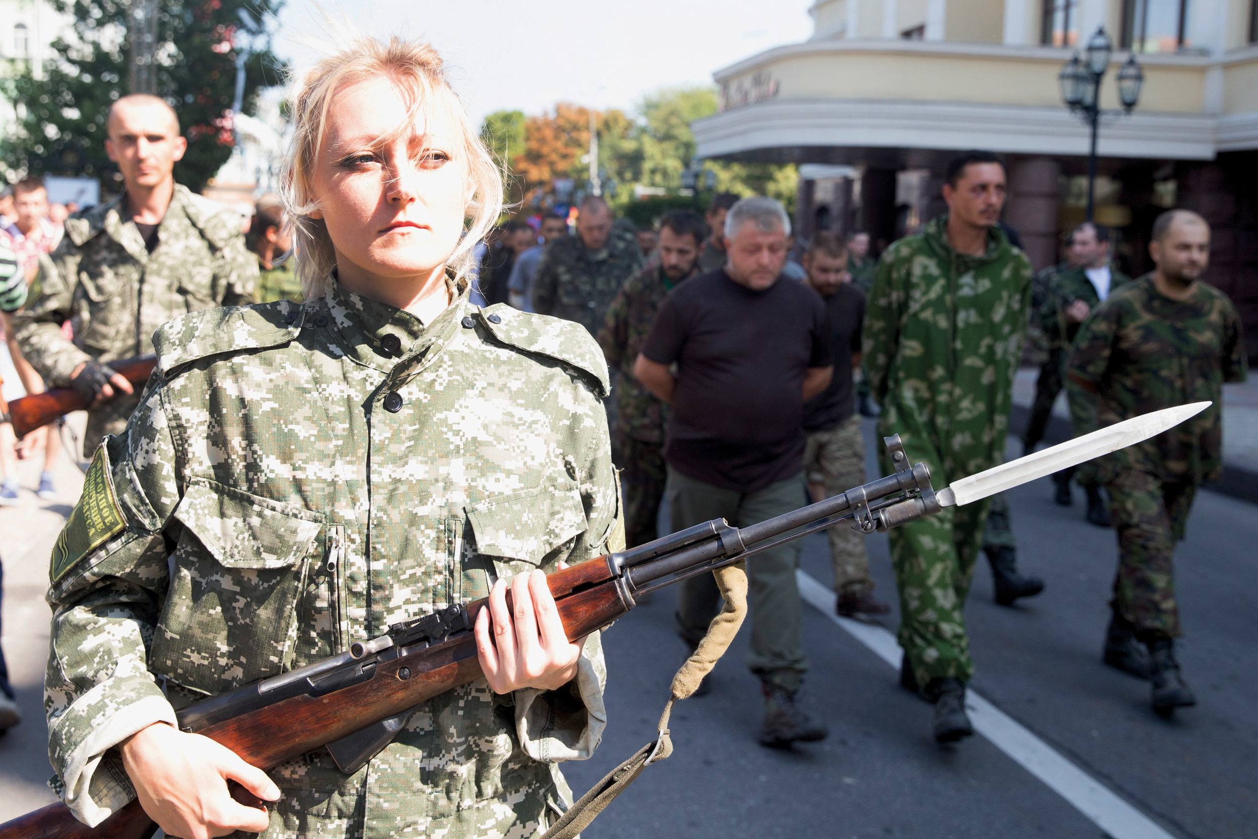  Pro-Russian fighters are seen escorting Ukrainian POWs on the streets of Donetsk 