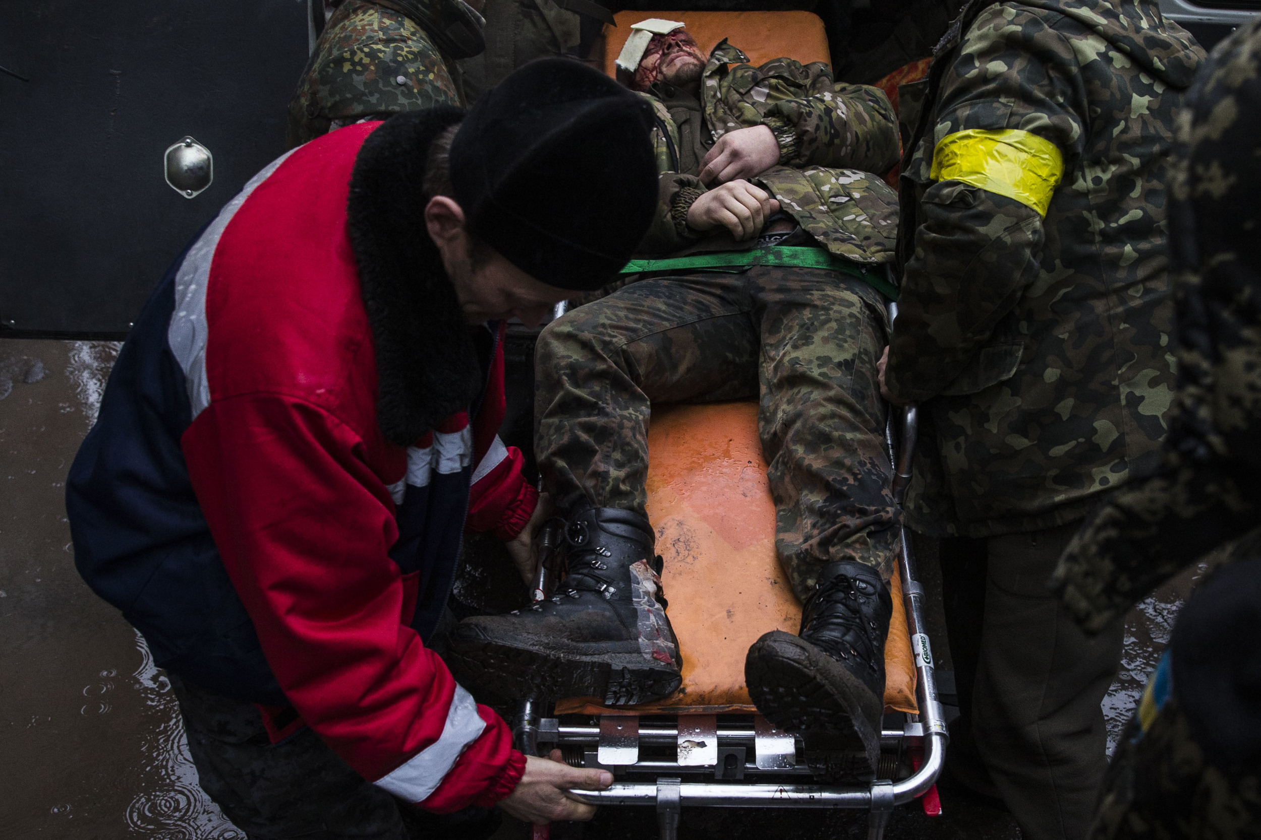  Ukrainian soldier is seen wounded as he is transferred to the hospital after fights in Debaltsevo area 