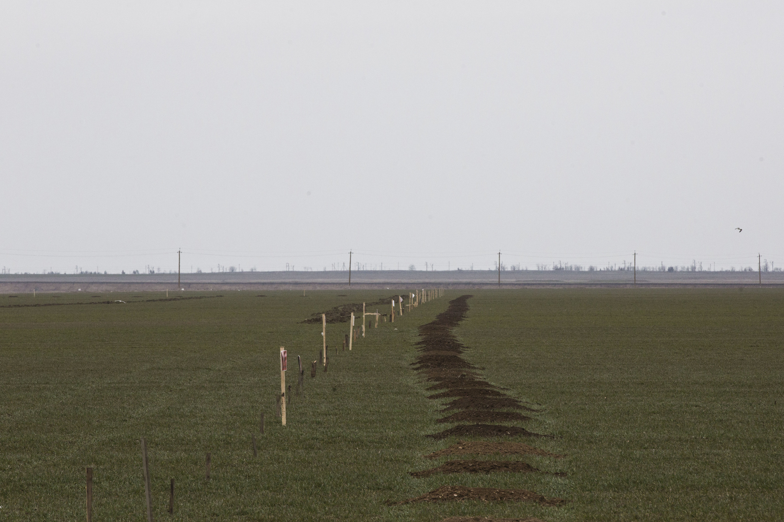 Minefield and a border line are prepared by Russian soldiers in Ukrainian region Kherson next to Crimean peninsula