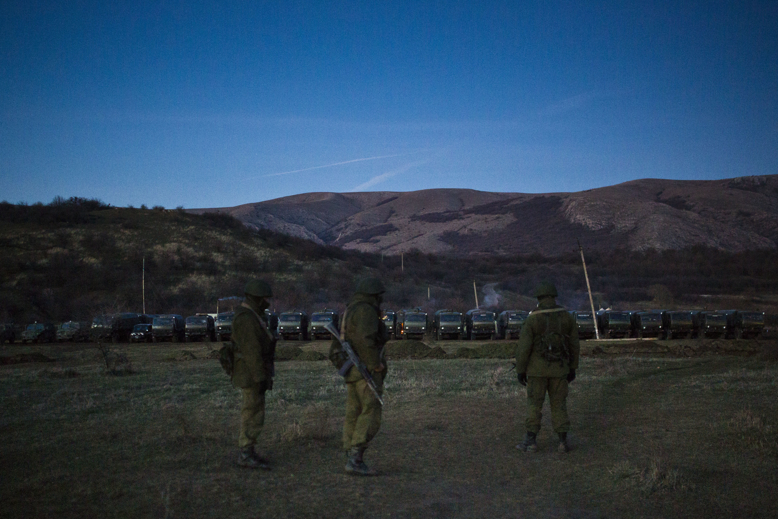  Russian soldiers are seen guarding their camp that blocked one of Ukrainian army military bases in Crimea 