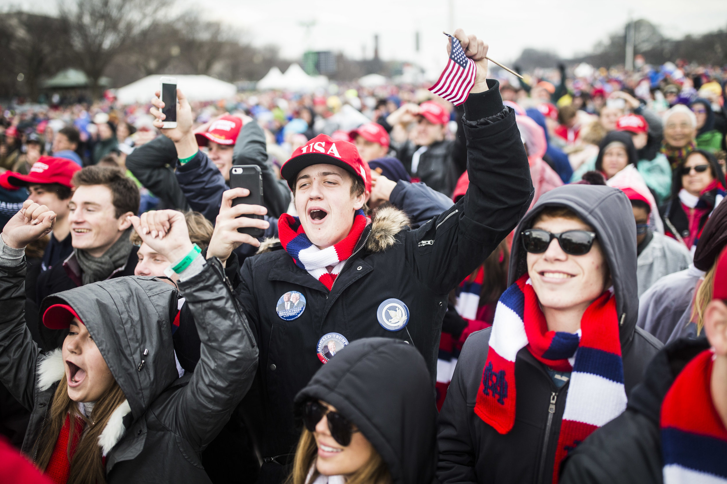  Donald Trump's supporters on National Mall celebrate him finishing his inauguration speech 