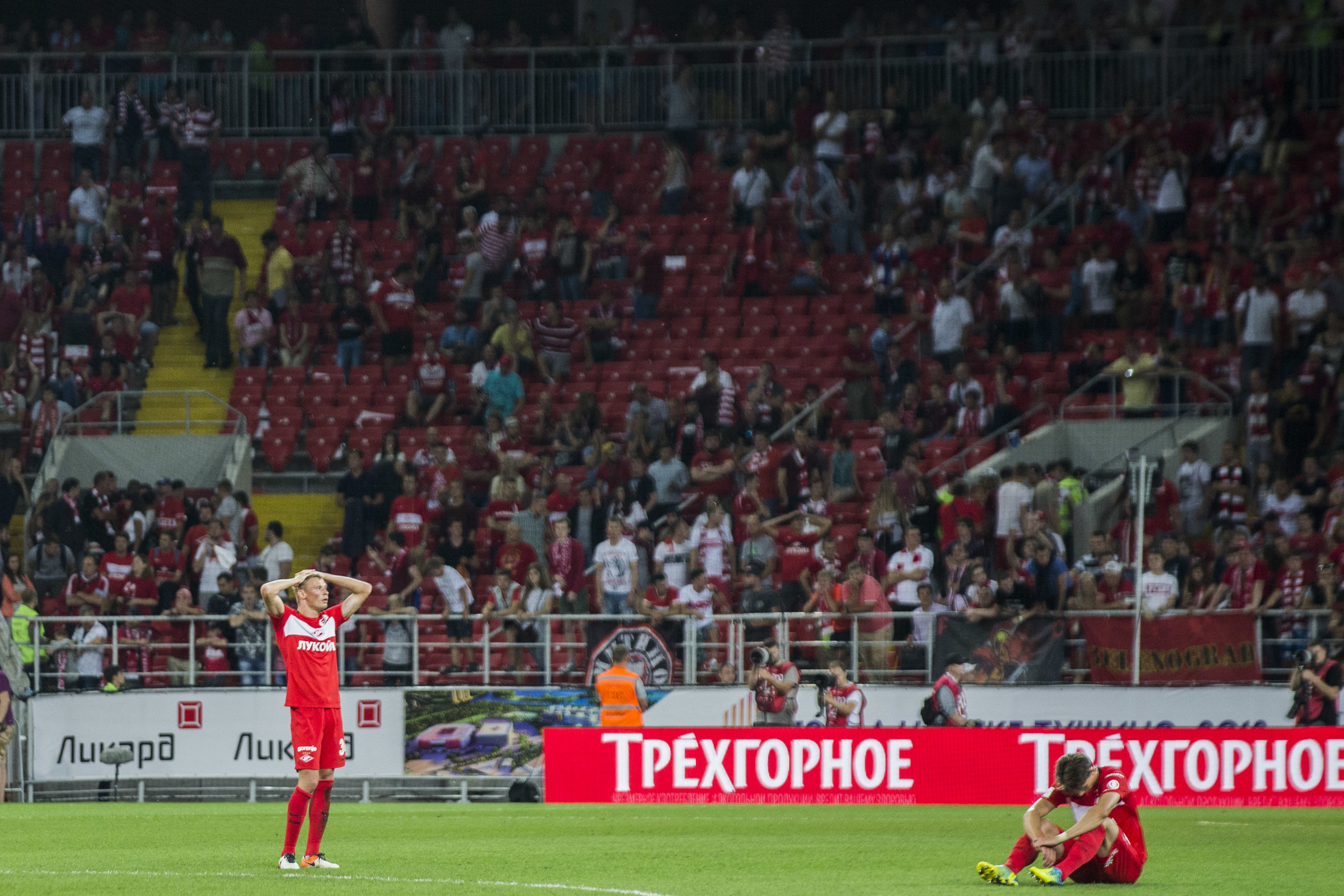  Spartak Moscow players Evgeny Makeev (left) and Ilya Kutepov react as their team loses in UEFA Europa League 3rd qualifying round to an underdog team AEK from Cyprus. August 4th, 2016 
