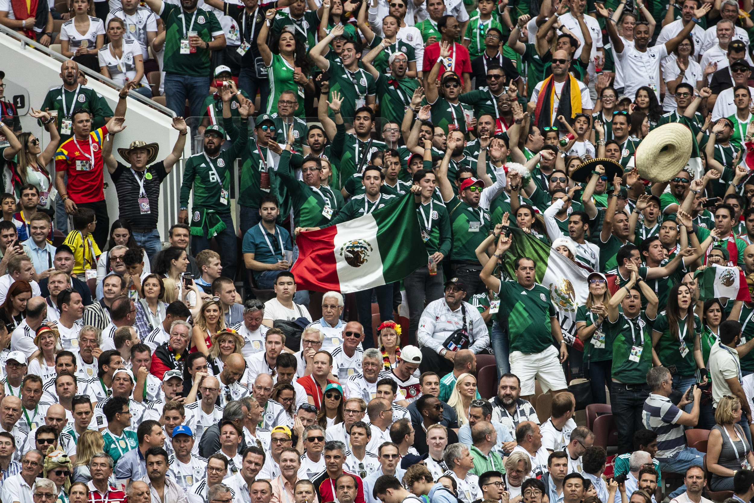  German and Mexican fans are seen during their teams' game in Moscow 