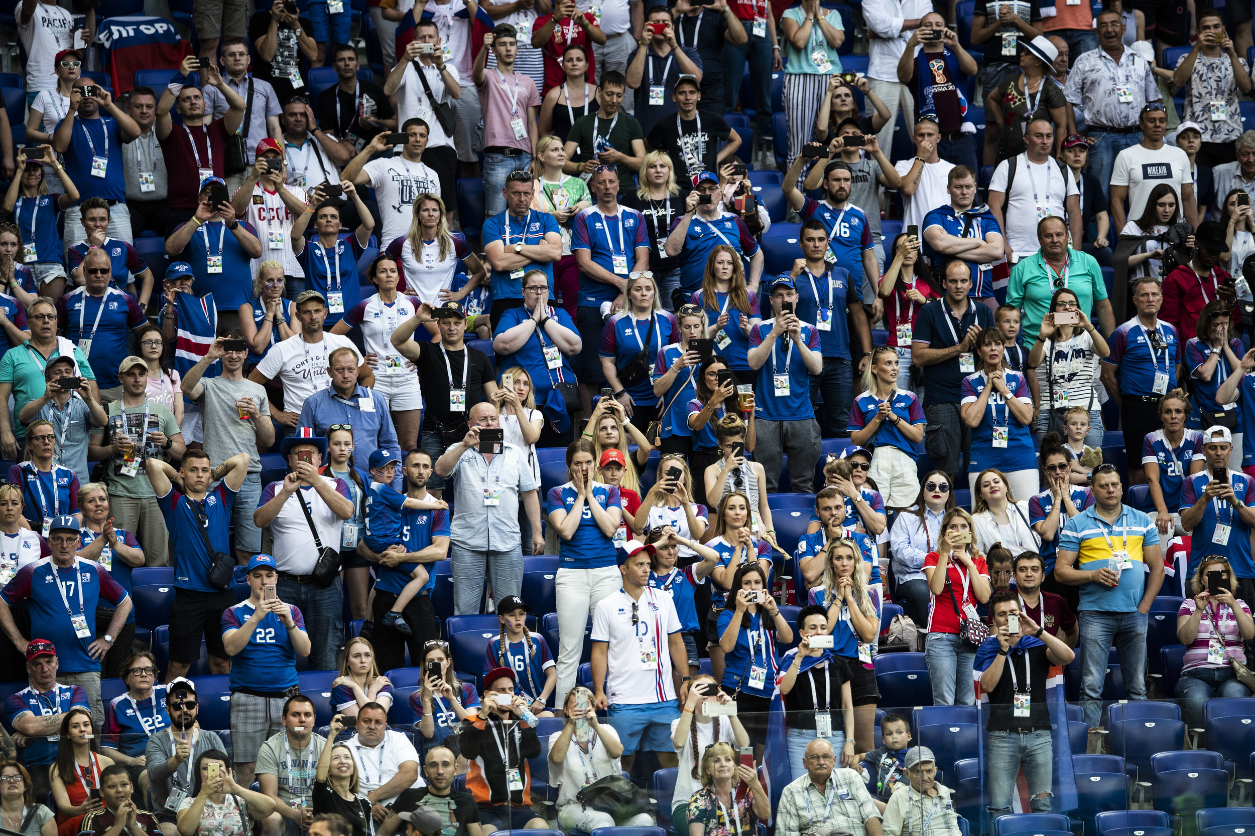  Icelanders react as their team is awarded with a penalty kick during a game against Nigeria in Volgograd 