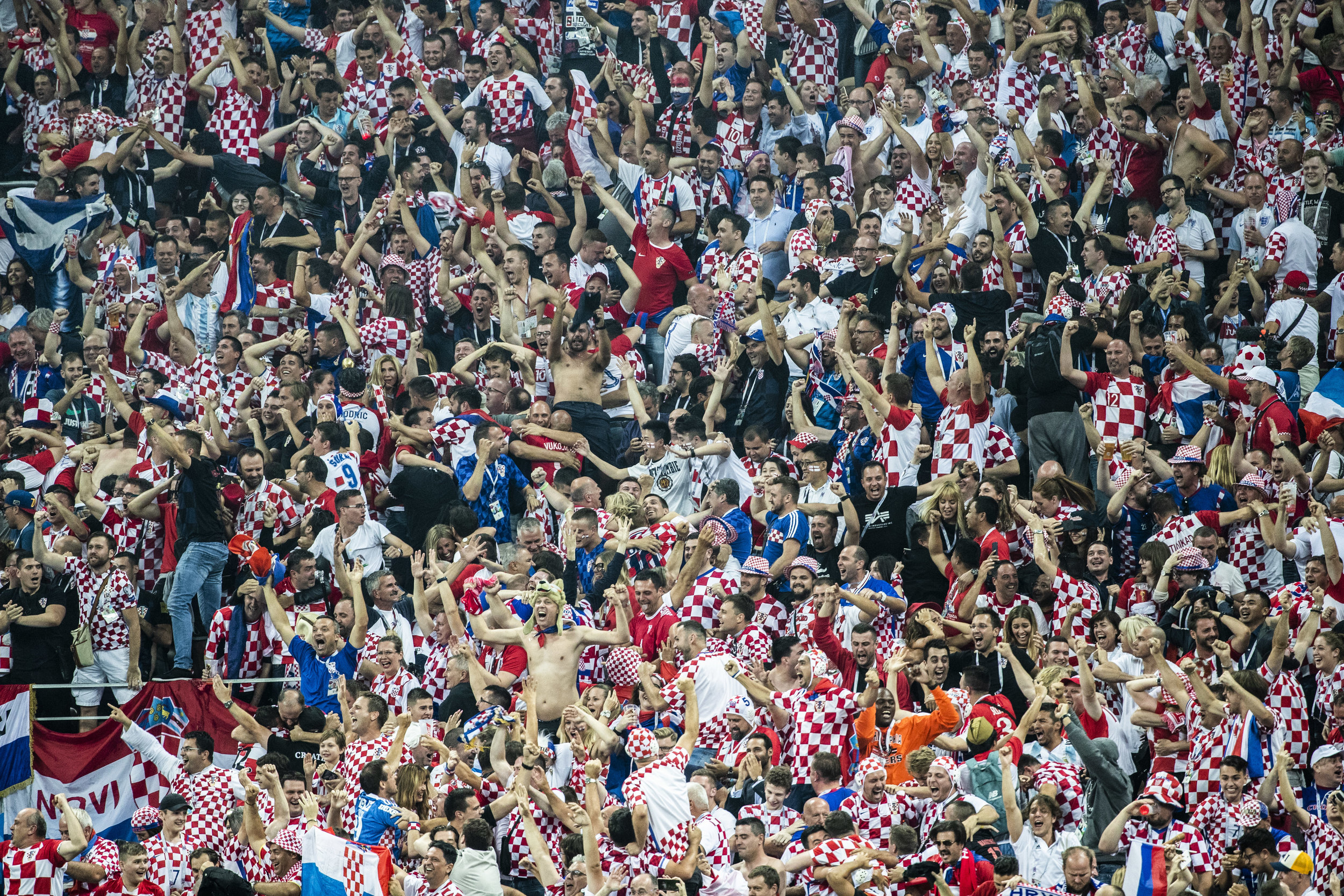  Croatians cheer as their team continues to attack after scoring a late goal during additional time in a semifinal game against England in Moscow 