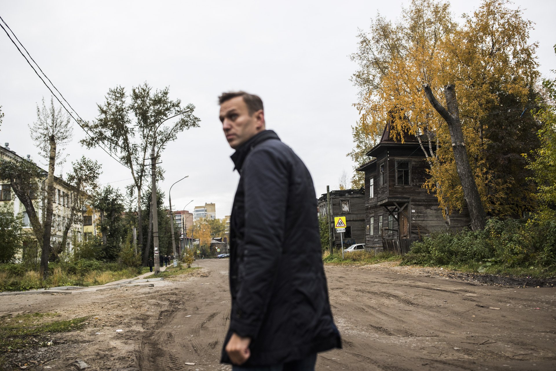  Alexey Navalny looks at crumbling houses in Arkhangelsk, Russia, a city some 1000 kilometers from Moscow to the north, on October 1, 2017. Campaign trips let Navalny see the poverty many Russians live in.This is a news photo, shot without any influe