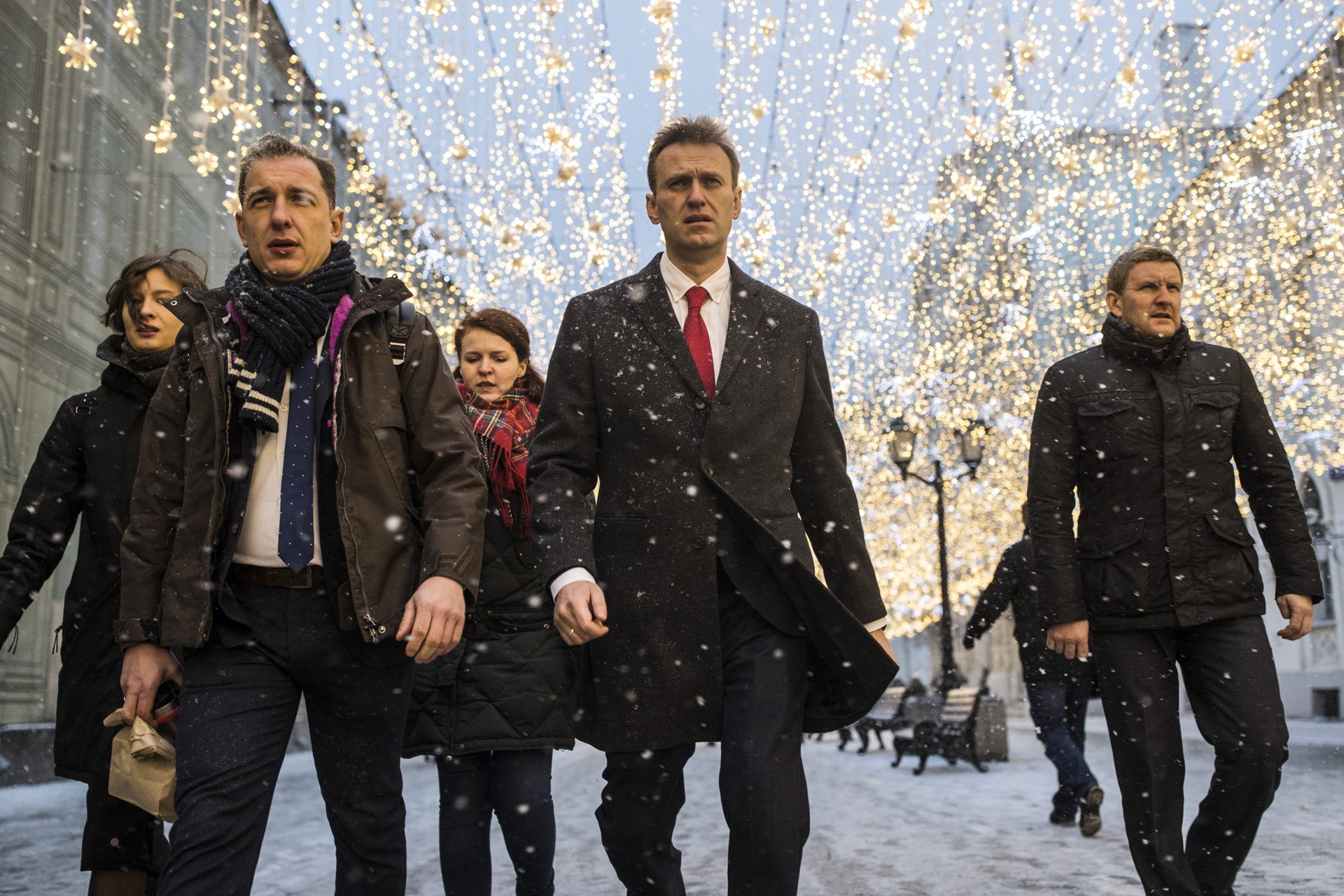  Alexey Navalny and members of his campaign and Anti-corruption foundation stuff head to Russian Central Election Сommission session in Moscow, Russia on December 25, 2017. The government has passed a law that prohibits anyone with a criminal convict