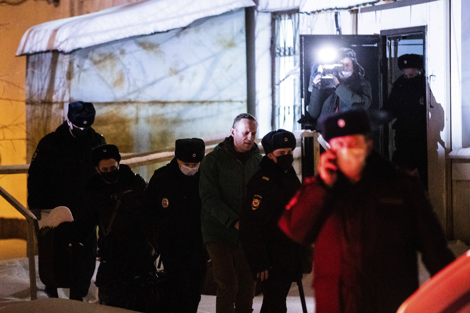  Alexey Navalny is seen being taken into custody at a police station in Khimki, near Moscow, Russia on January 18, 2021. The government claimed his treatment is Germany to be an avoidance of criminal conviction suspension terms. A judge was deliberat