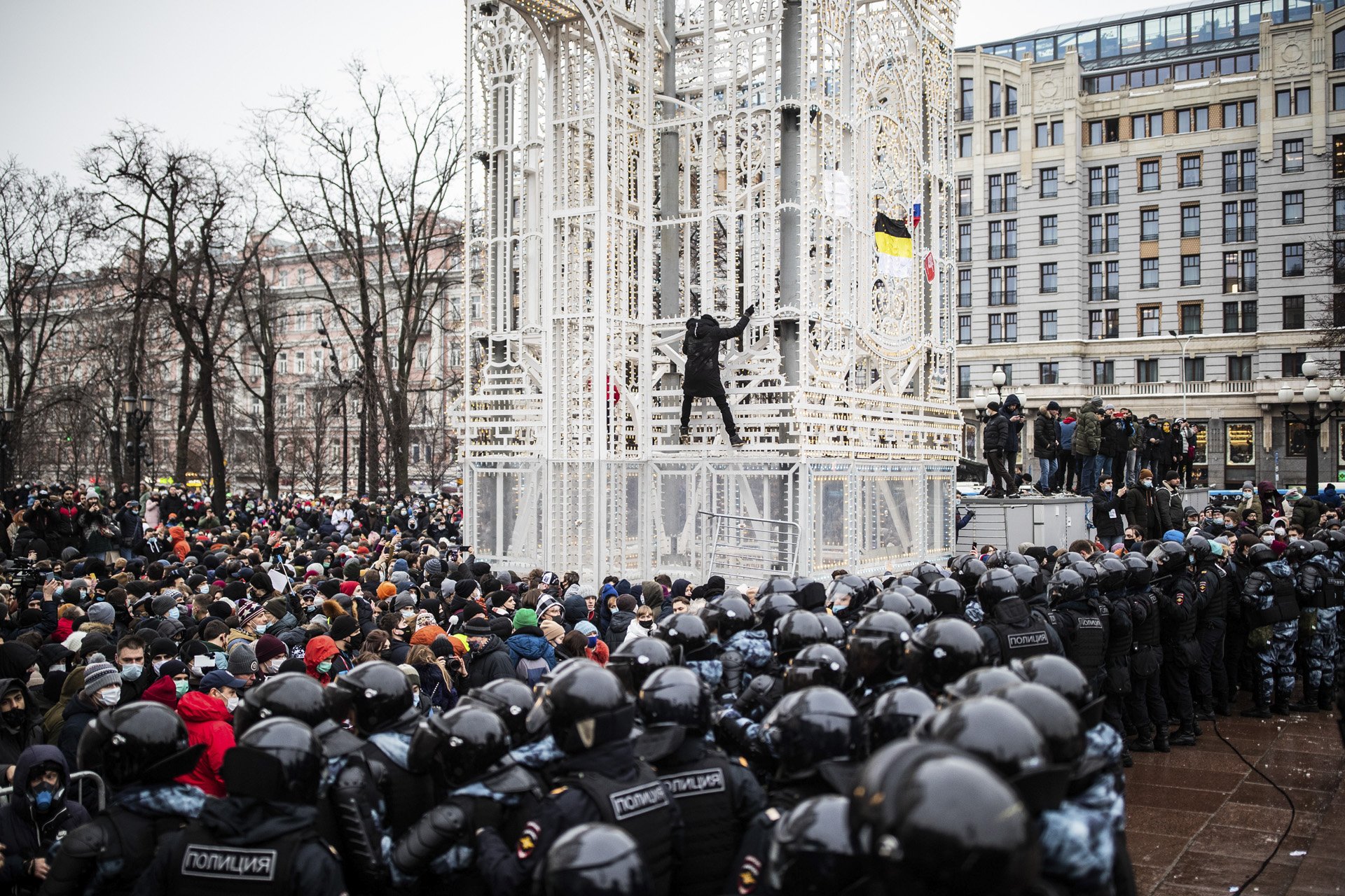  Riot police officers are pushing the crowd of Navalny’s supporters out of the public square in Moscow on January 23, 2013. 
