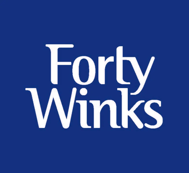 Forty Winks - Logo Only - CMYK - White on Blue - Stacked.jpg