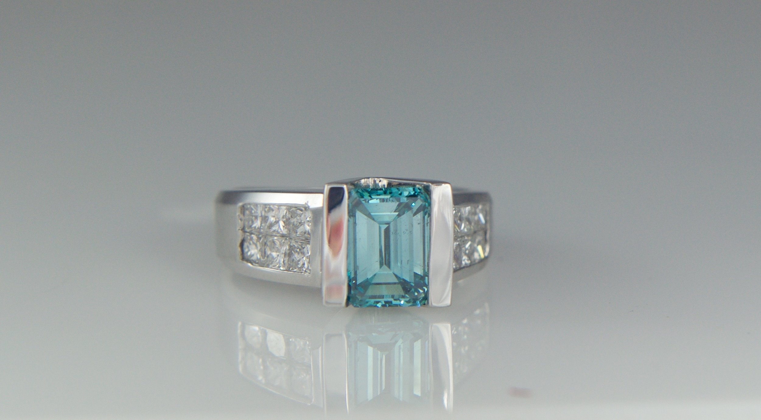 Blue Emerald cut diamond engagement ring