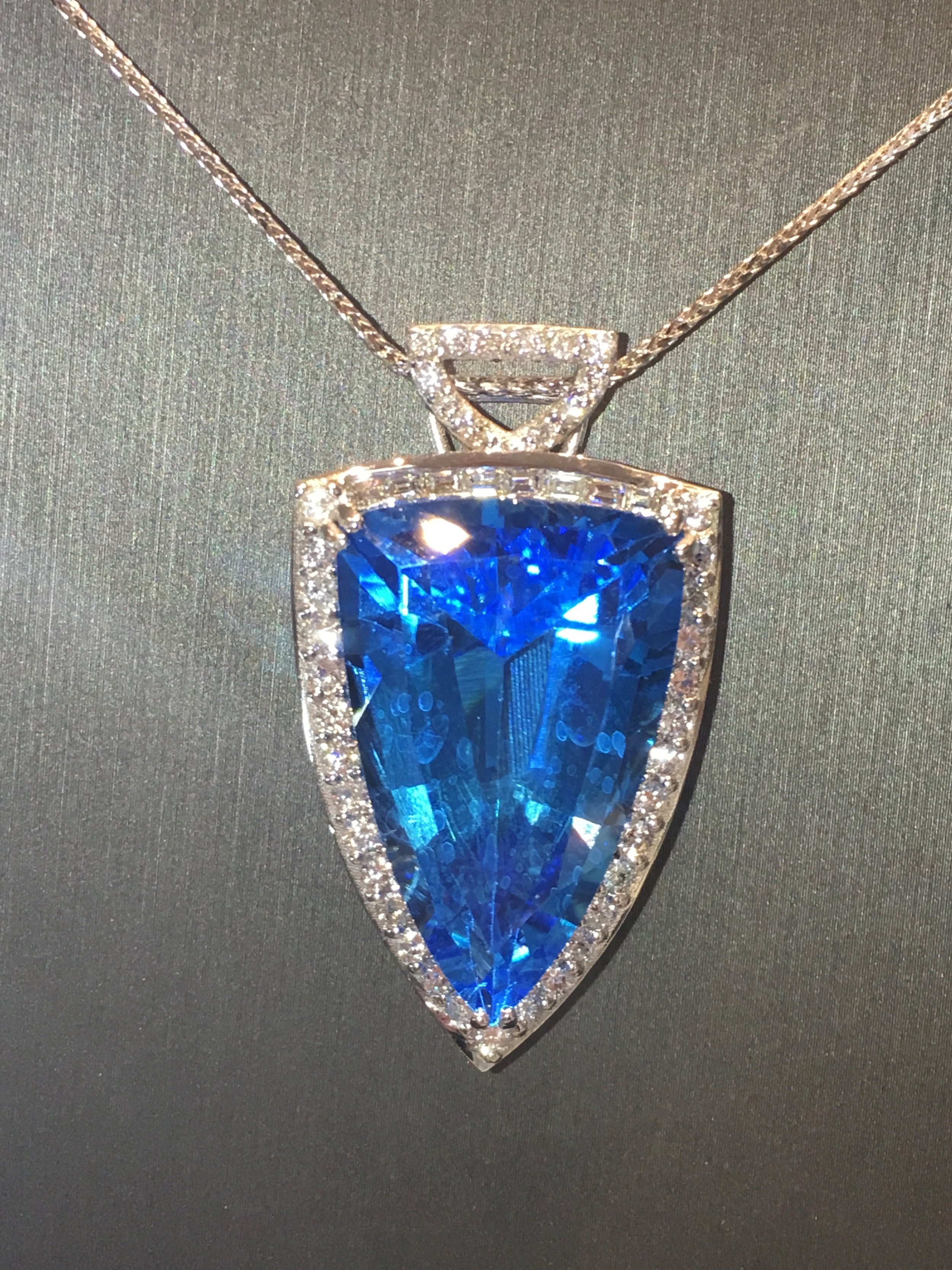 Blue topaz and diamond statement pendant