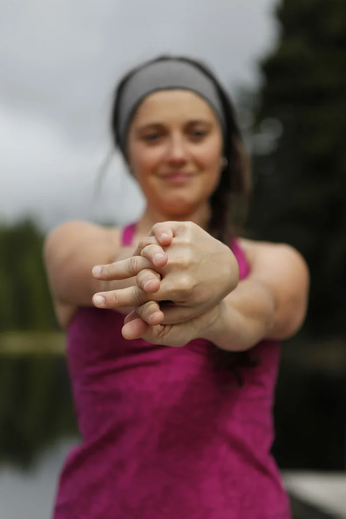 Super important to stretch the forearms after a long ride. Keep your shoulders down and note the thumb position, facing downwards. Make sure you stretch both sides.