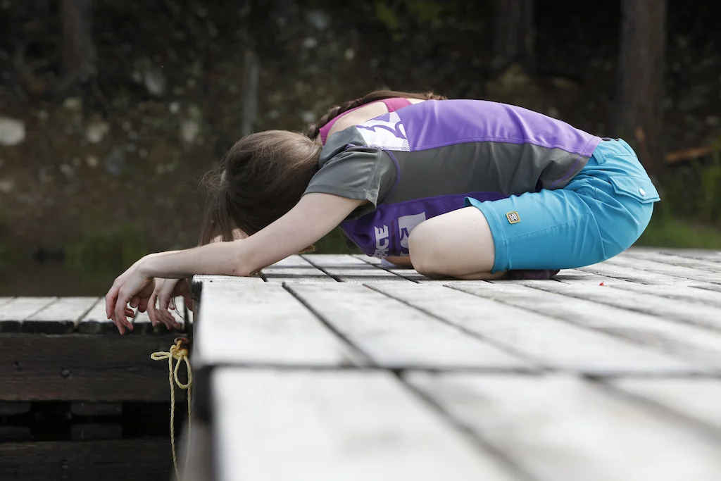 I like this one. You sit cross legged and let your hands dangle over the edge. But see how my butt isn't on the dock?