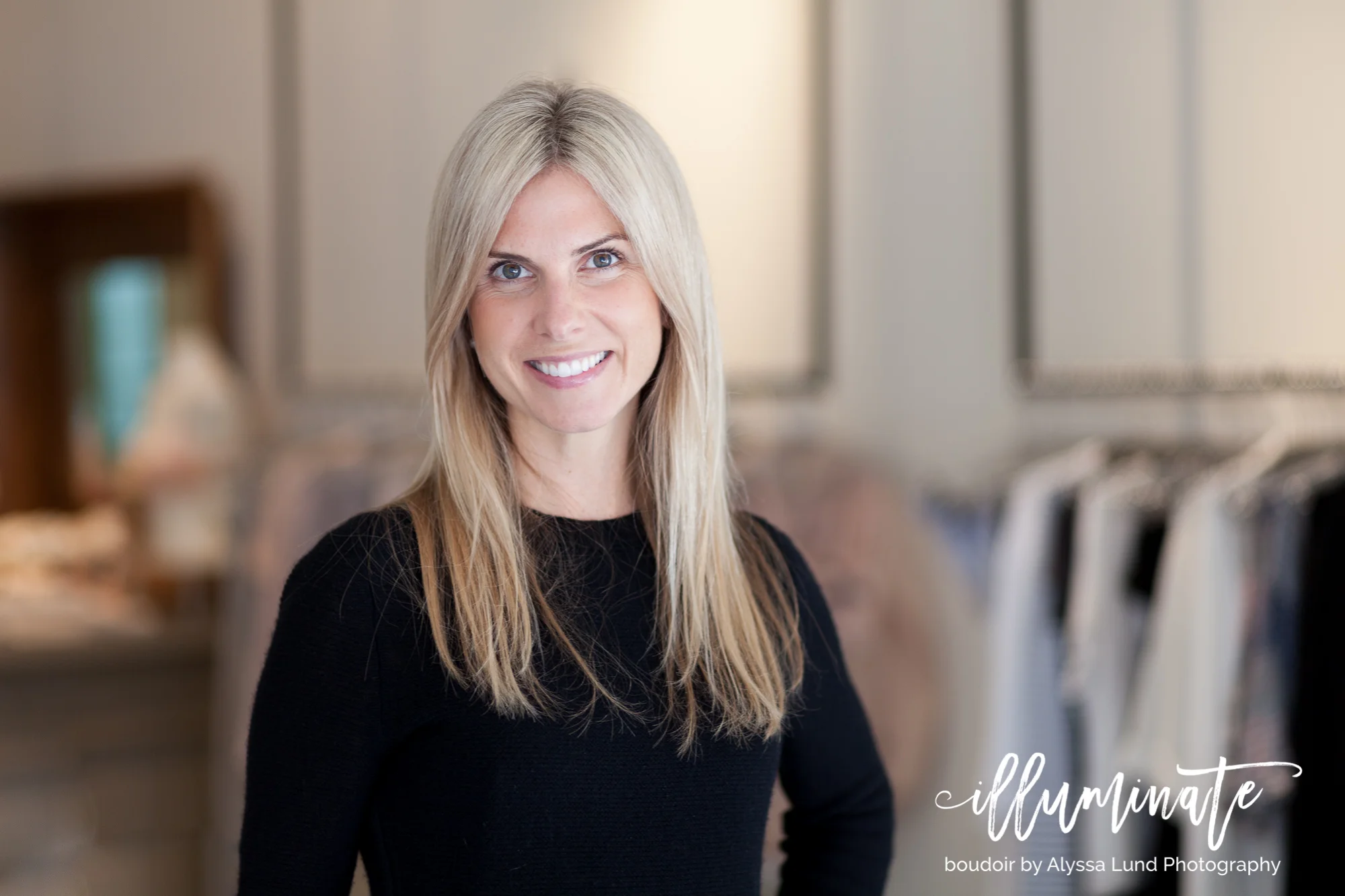 Beth near the front window of Room No. 3 at 50th and France. If you, like many women planning a boudoir session, are planning to purchase a new item or two for your portraits, I cannot imagine a more lovely place to select elegant, beautiful clothin…