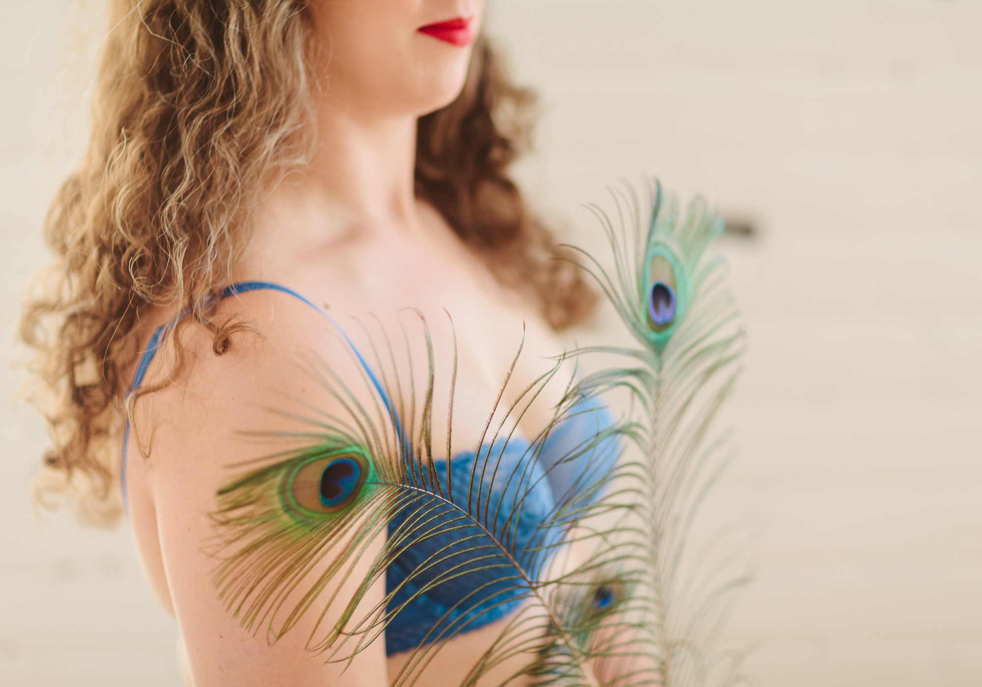 Accessories: V brought a few peacock feathers along to her session - we included them in just one picture, but this is so full of personality and feels natural, strong, and atmospheric.